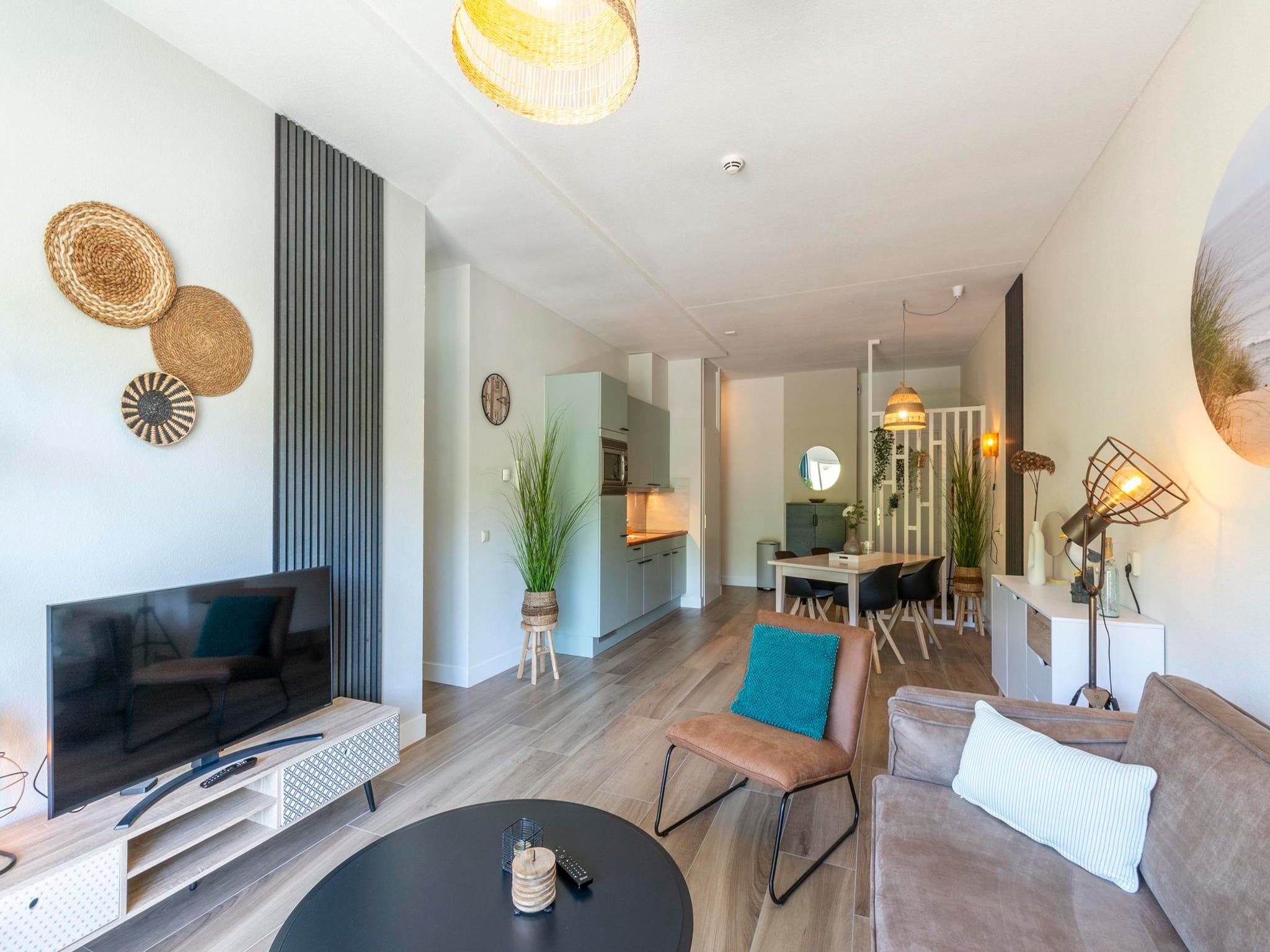 De woonkamer van Wijde Blick 112 in Callantsoog