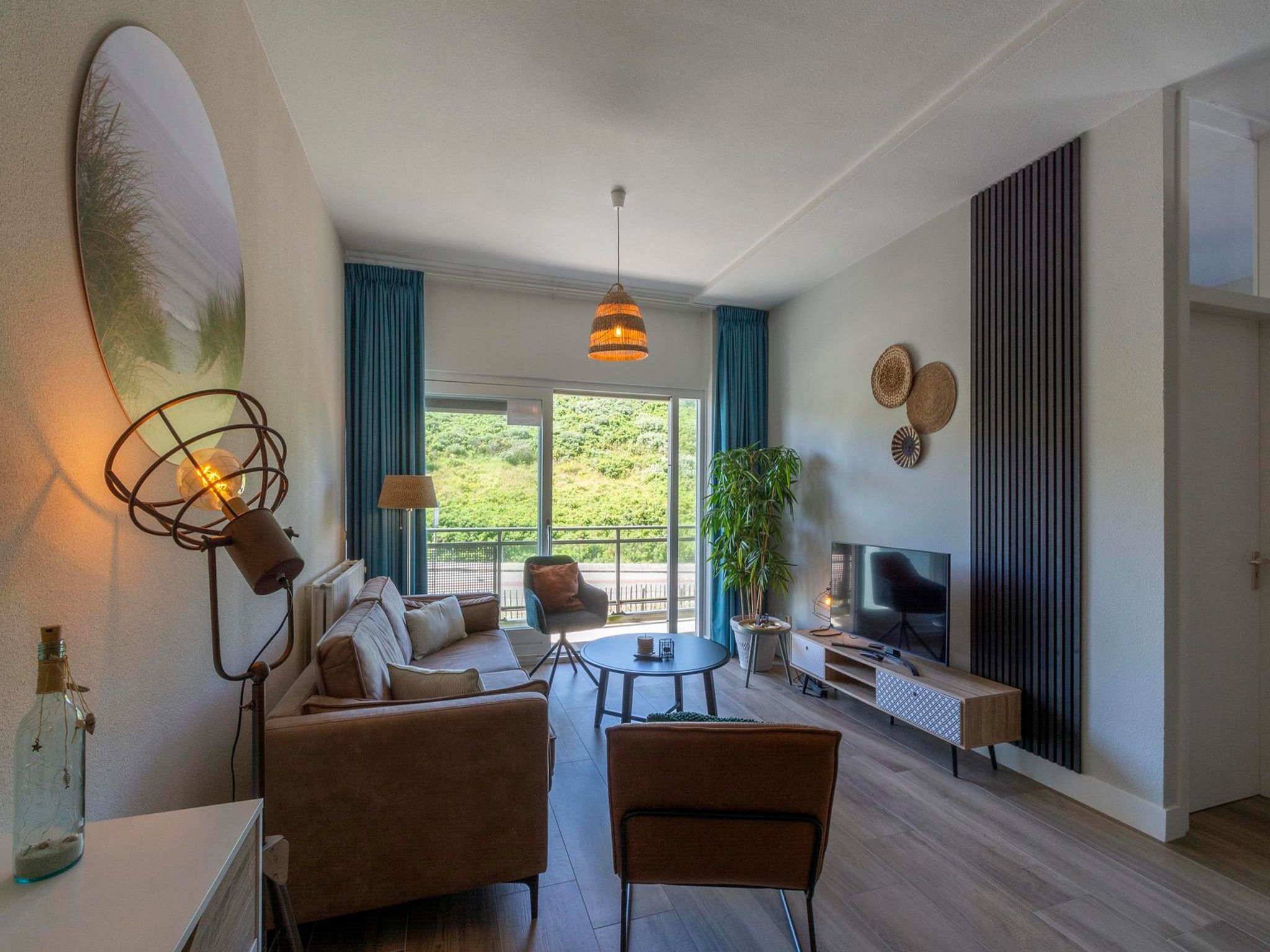 De woonkamer van Wijde Blick 112 in Callantsoog