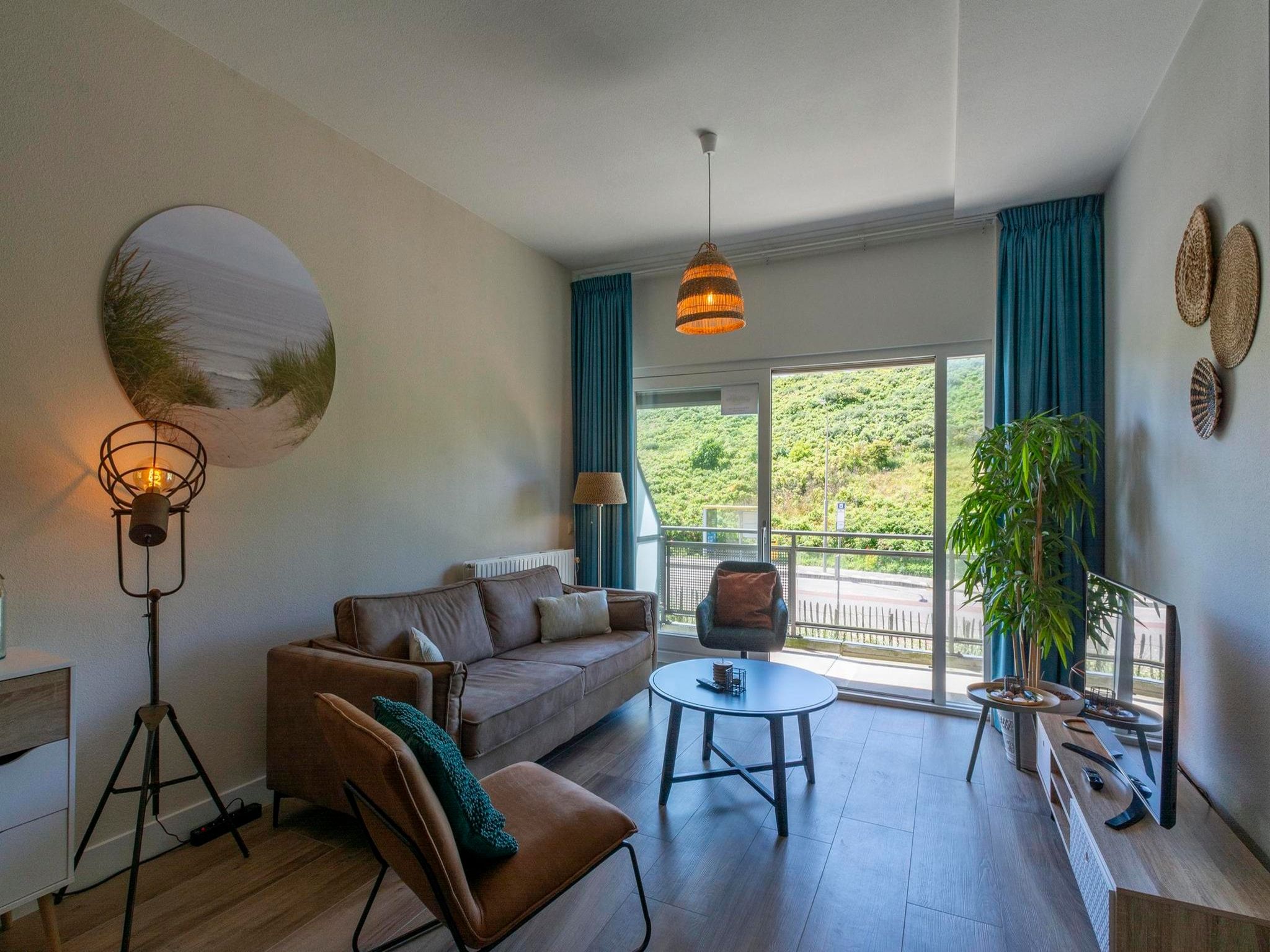 De woonkamer van Wijde Blick 112 in Callantsoog