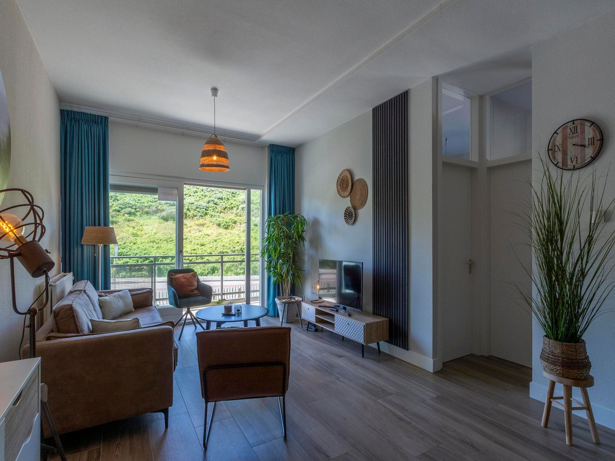 De woonkamer van Wijde Blick 112 in Callantsoog