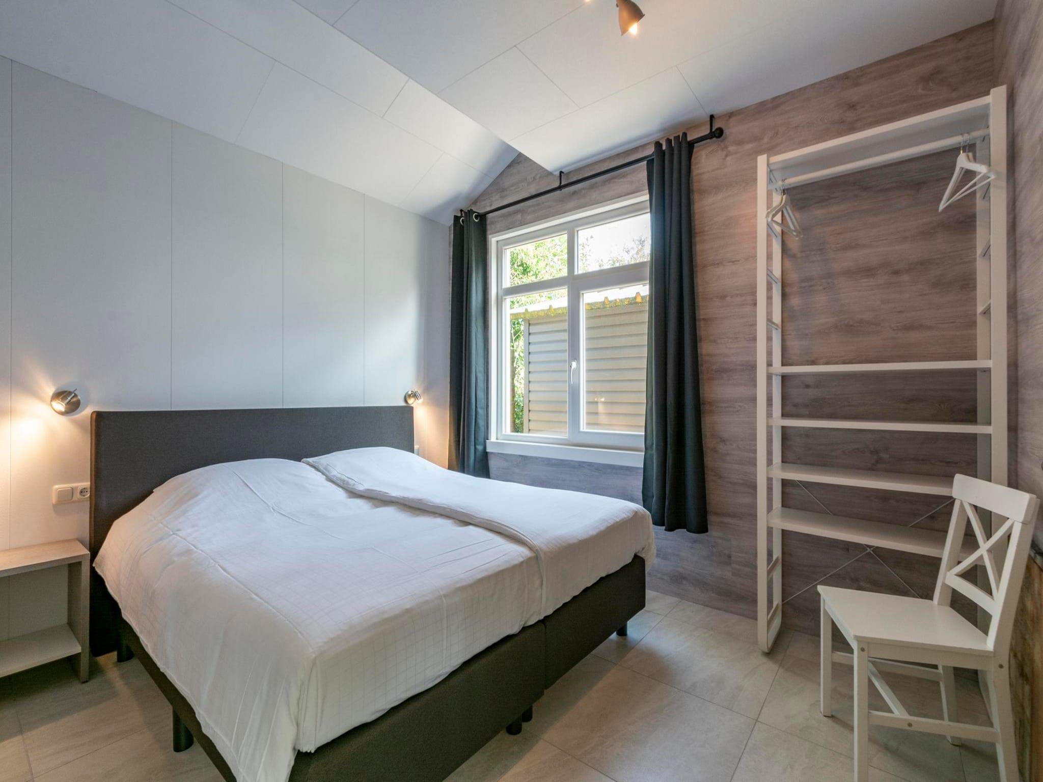 Een slaapkamer van Garnekuul 90 in Callantsoog