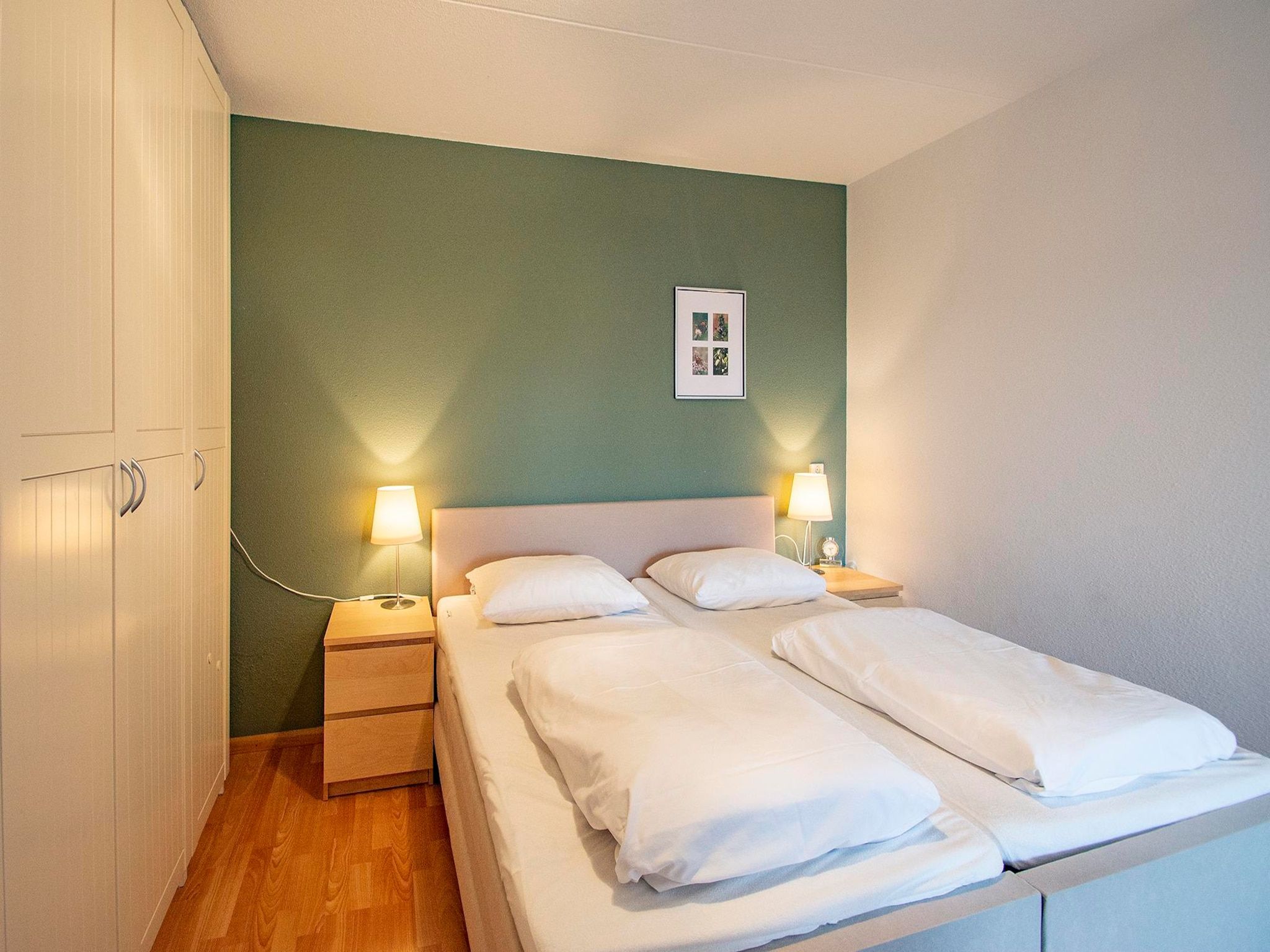 Een slaapkamer van Wijde Blick 203 in Callantsoog