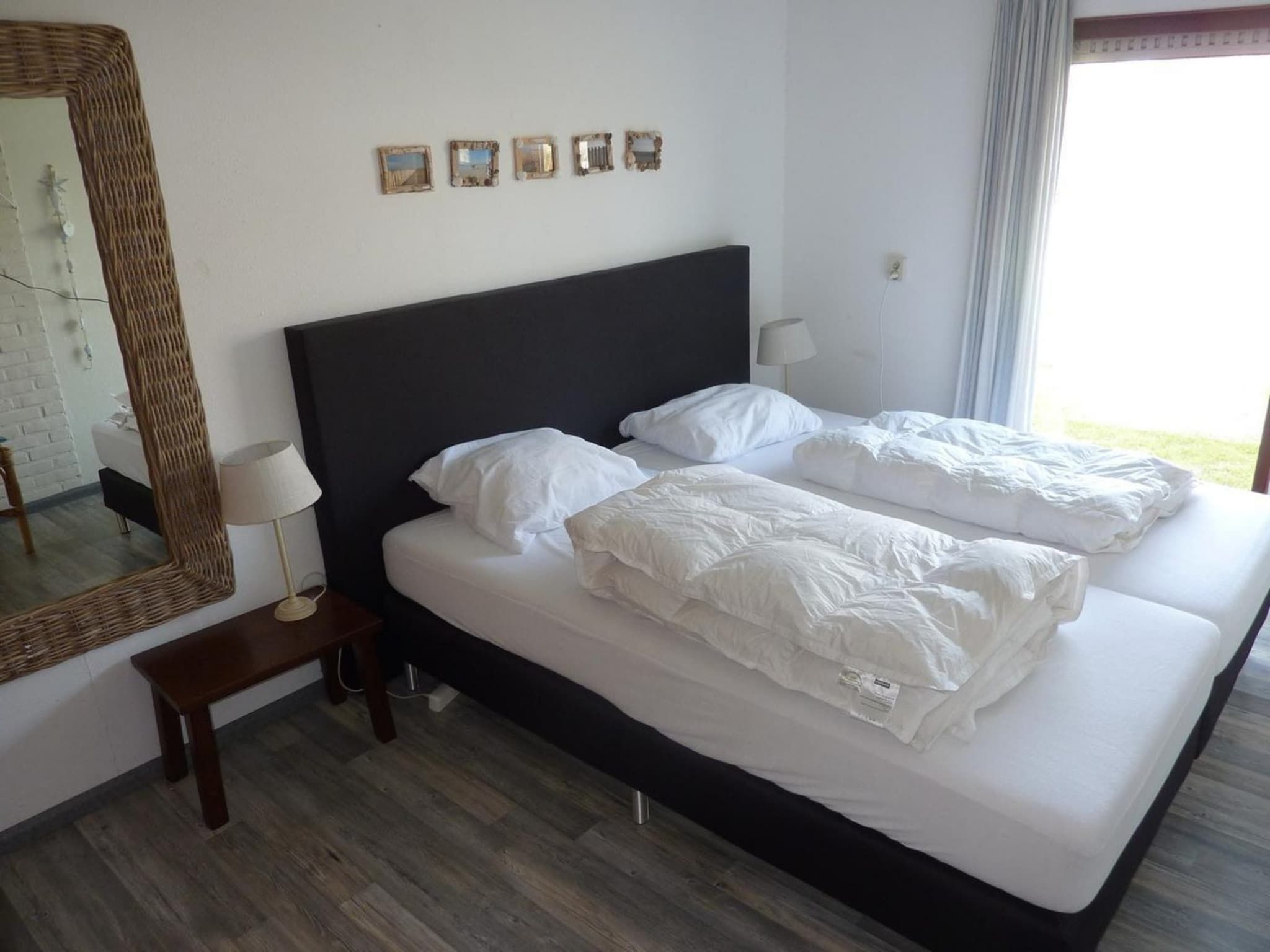 Een slaapkamer van Schoneveld 11 Zeester Breskens in Breskens