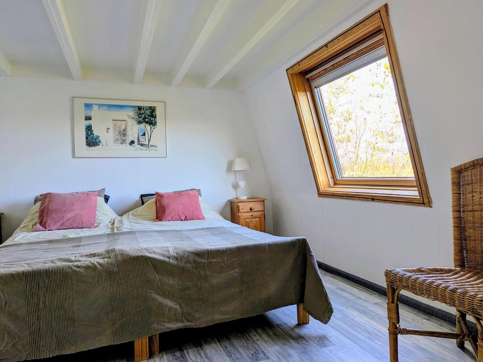Een slaapkamer van Schoneveld 11 Zeester Breskens in Breskens