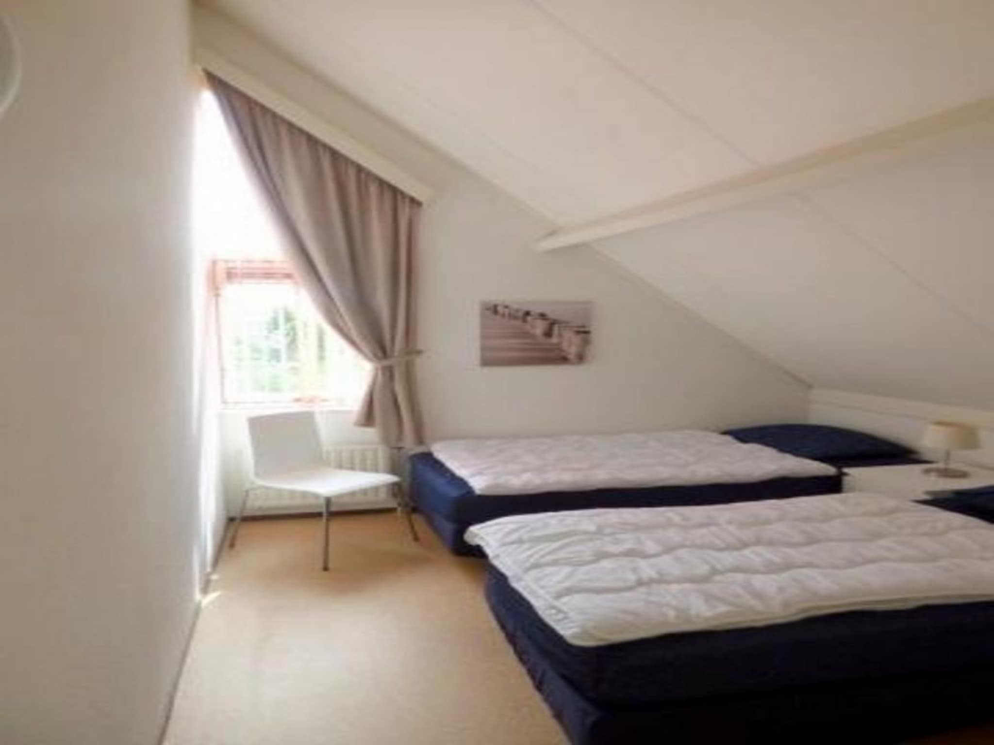 Een slaapkamer van Scheldeveste 153 Zwin Breskens in Breskens