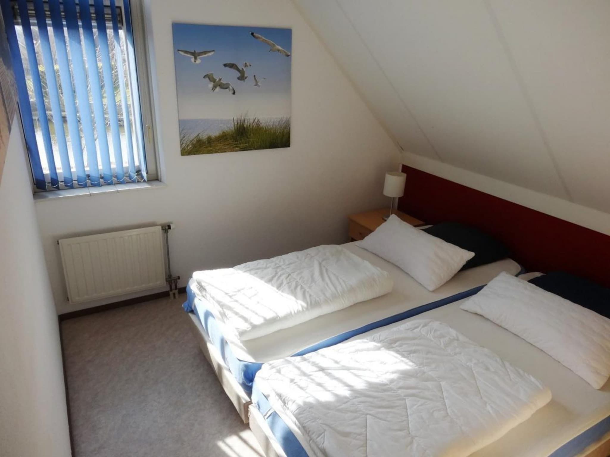 Een slaapkamer van Scheldeveste 161 ZwinBreskens in Breskens