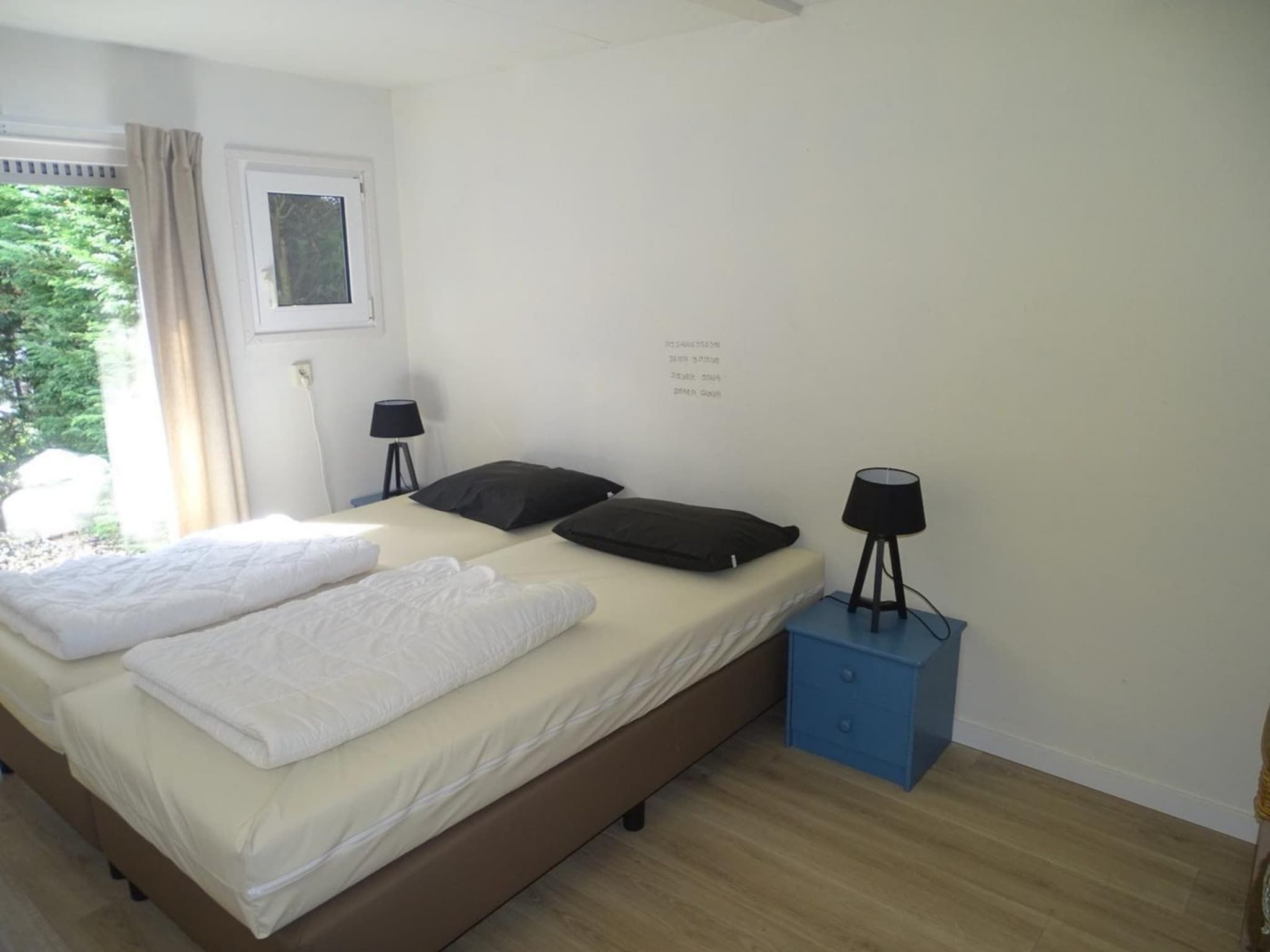 Een slaapkamer van Schoneveld 40 Zeester Breskens in Breskens