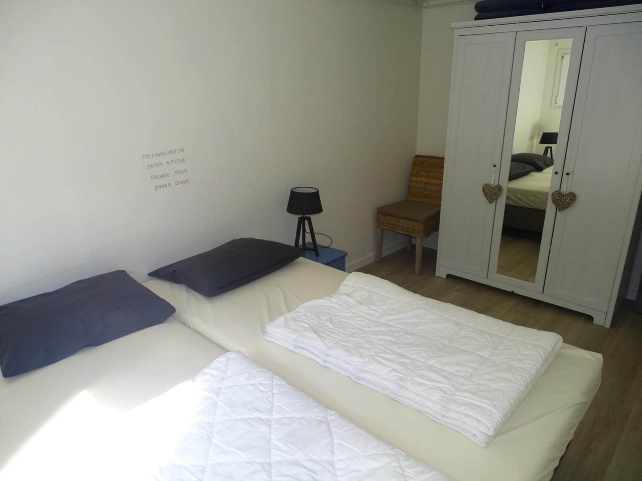 Een slaapkamer van Schoneveld 40 Zeester Breskens in Breskens