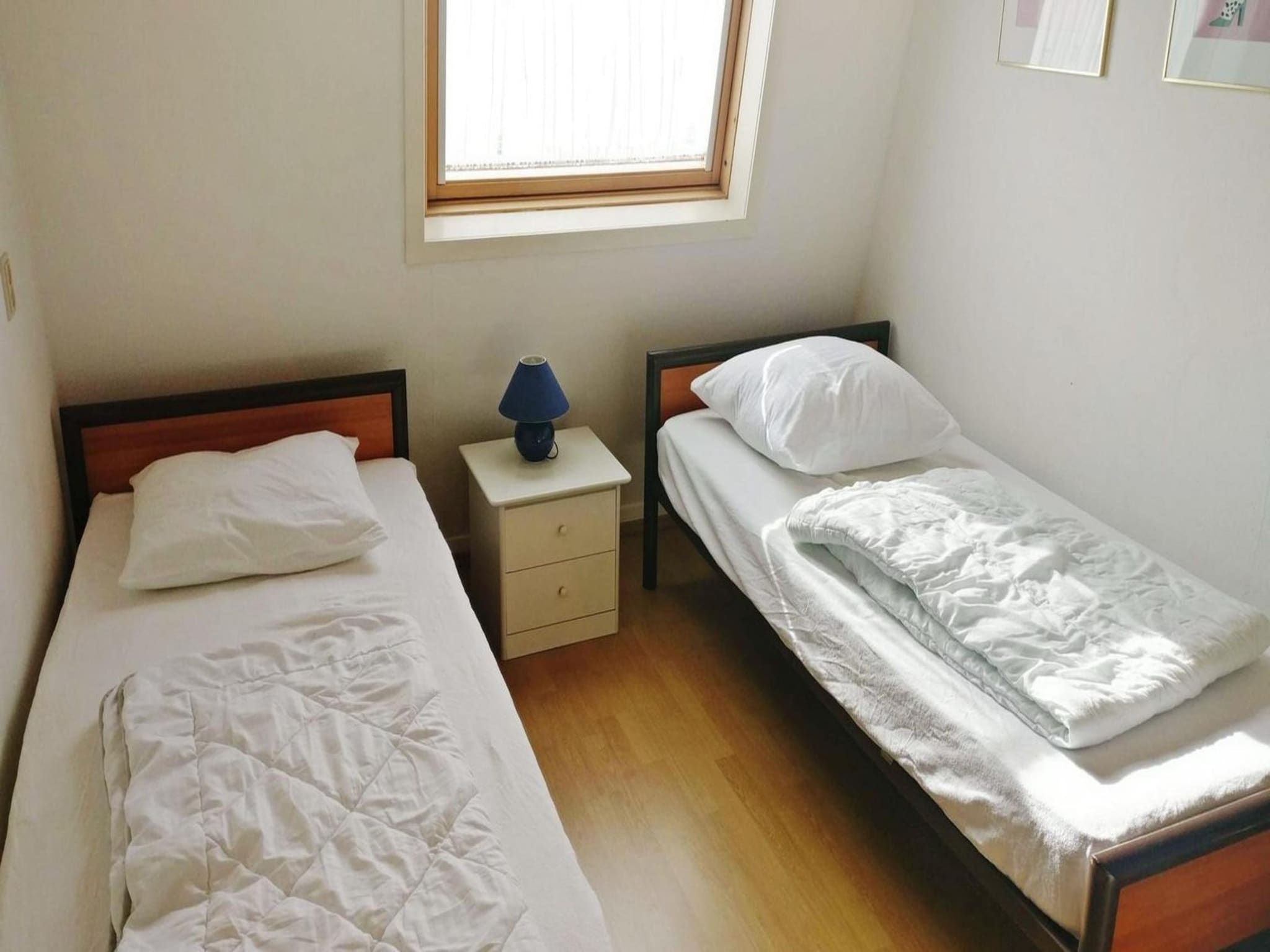 Een slaapkamer van Schoneveld 60 Zeester Breskens in Breskens