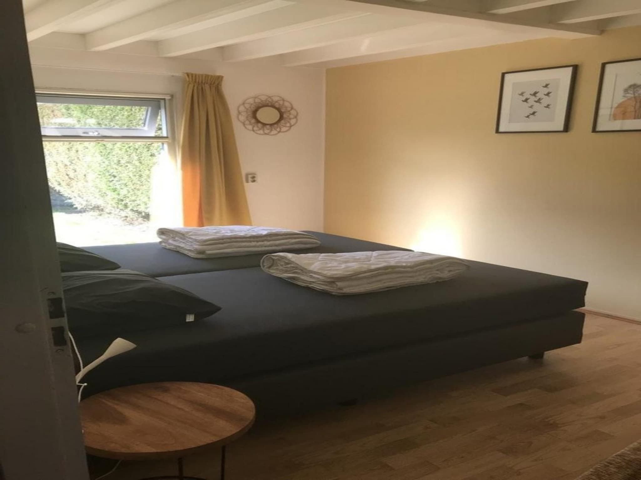 Een slaapkamer van Schoneveld 60 Zeester Breskens in Breskens