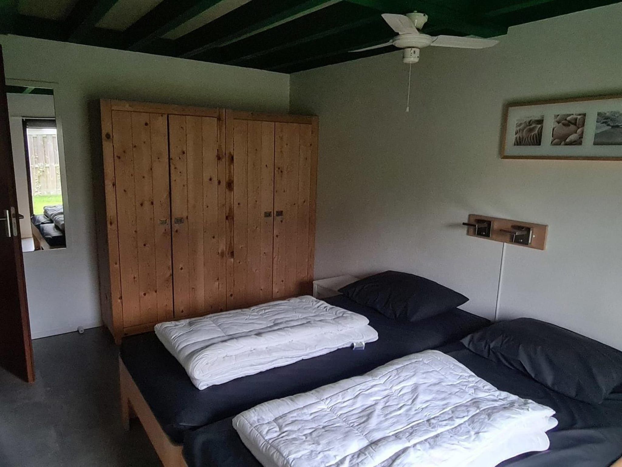 Een slaapkamer van Schoneveld 90 Zeester Breskens in Breskens