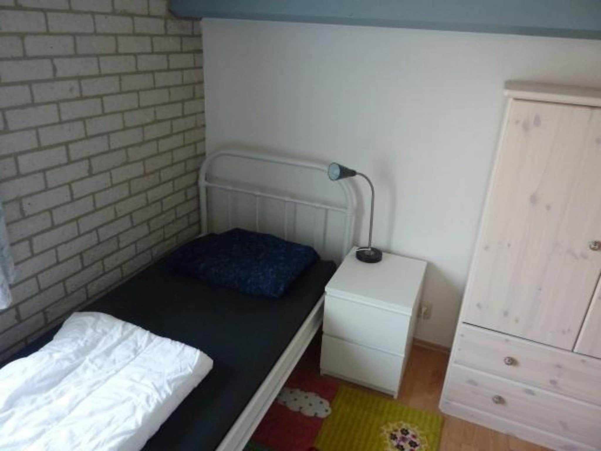 Een slaapkamer van Schoneveld 369 Strandparel Breskens in Breskens