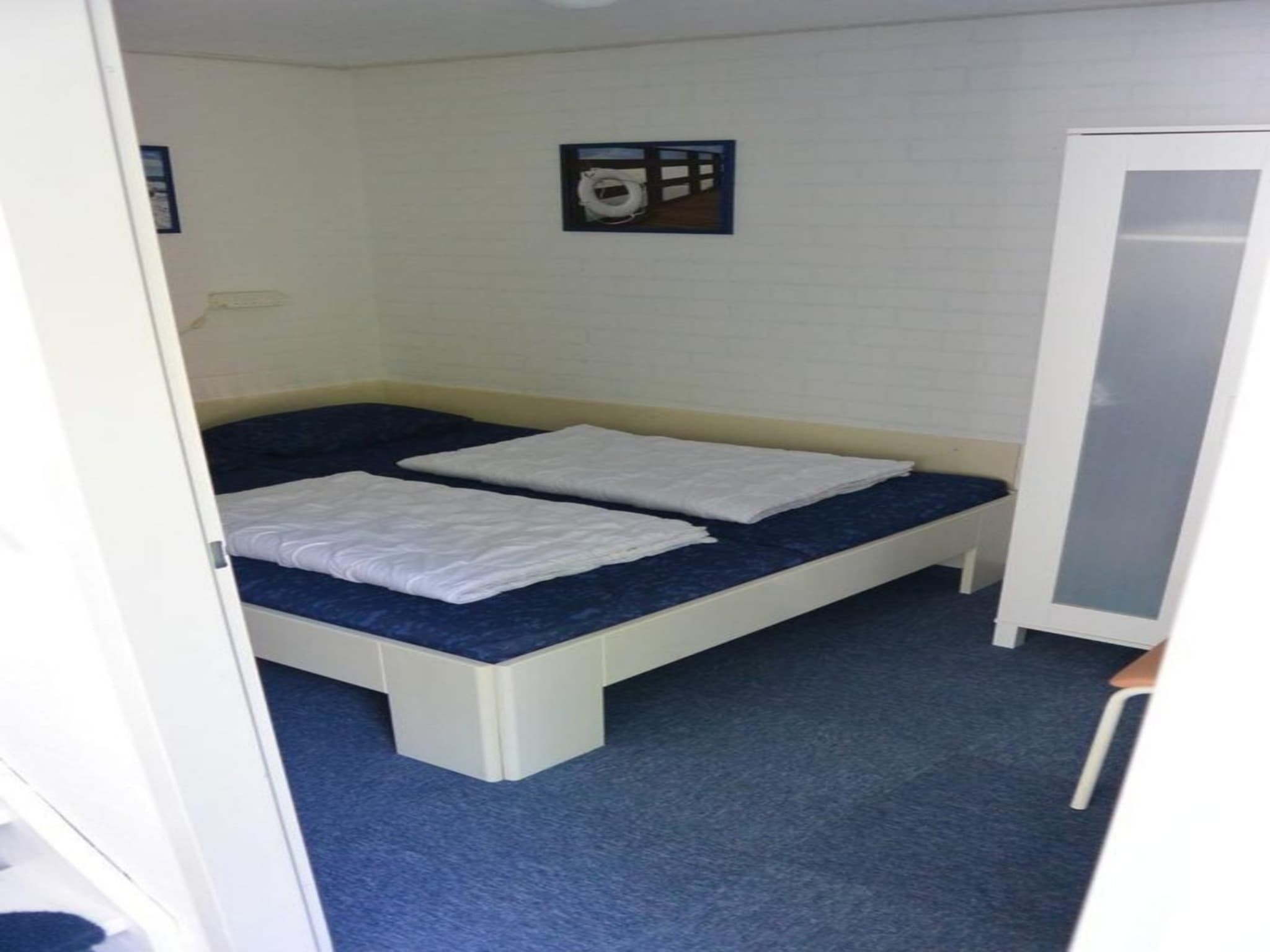 Een slaapkamer van Schoneveld 137 Duinroos Breskens in Breskens