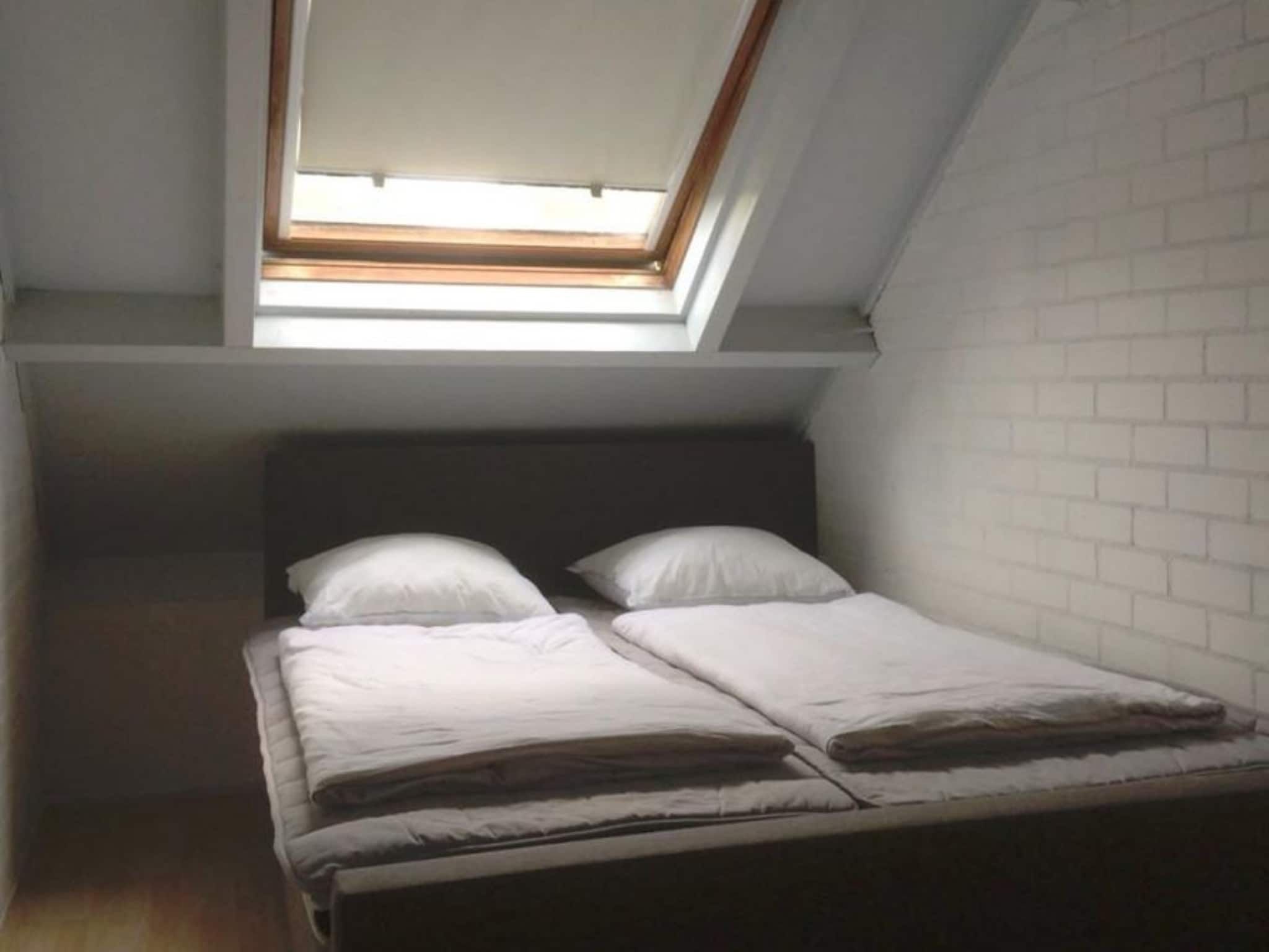 Een slaapkamer van Schoneveld 163 Duinroos Breskens in Breskens