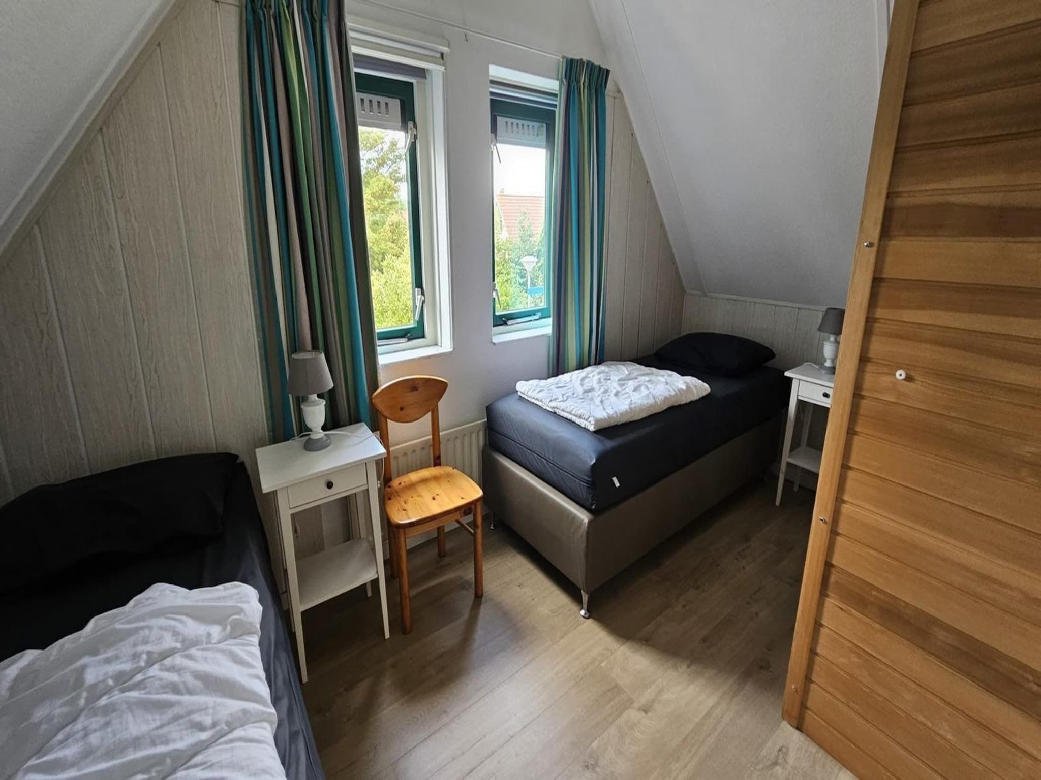 Een slaapkamer van Schoneveld 176 Zeemeeuw Breskens in Breskens