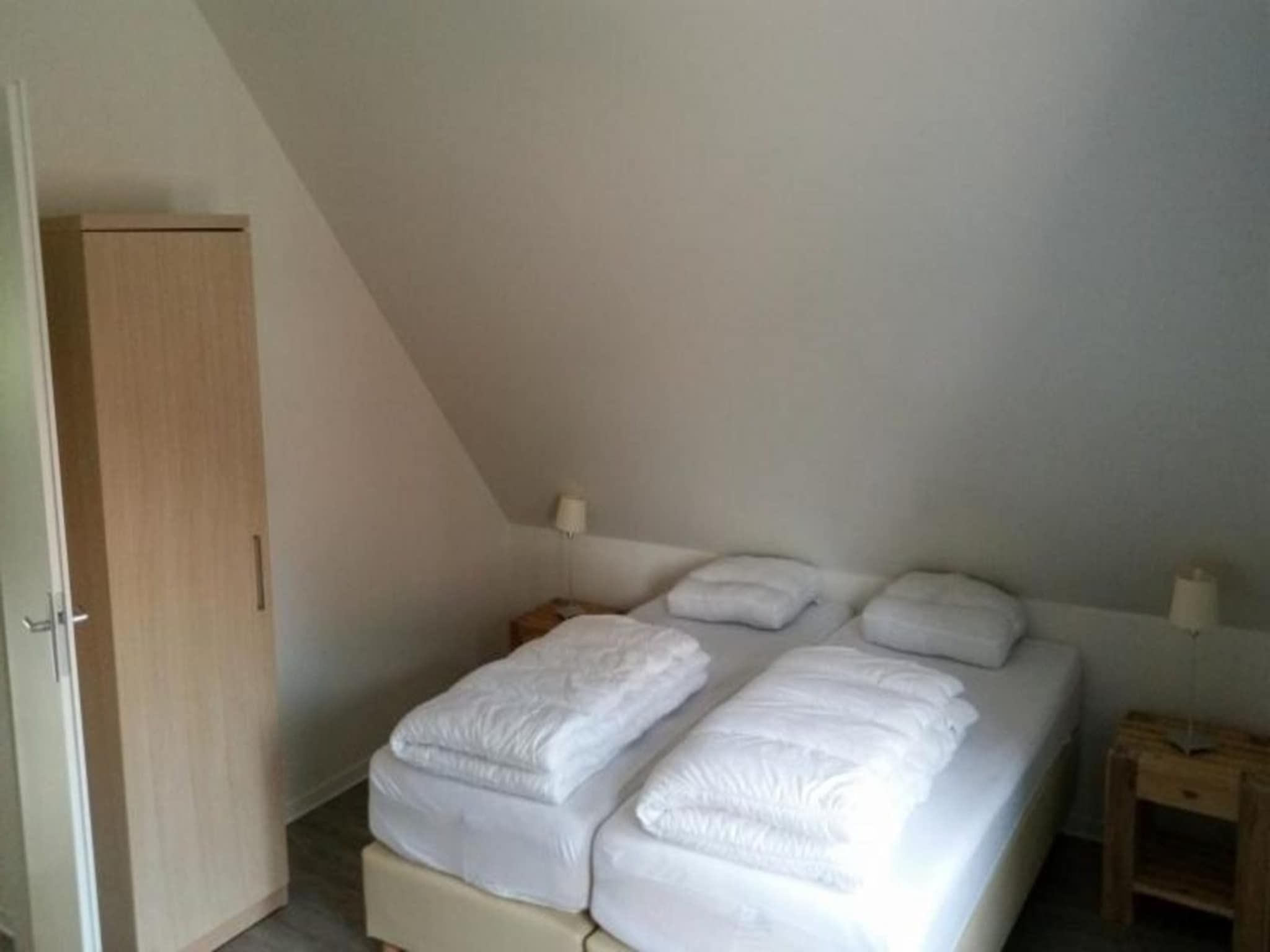 Een slaapkamer van Landgoed de Lente 30 Tulp Breskens in Breskens