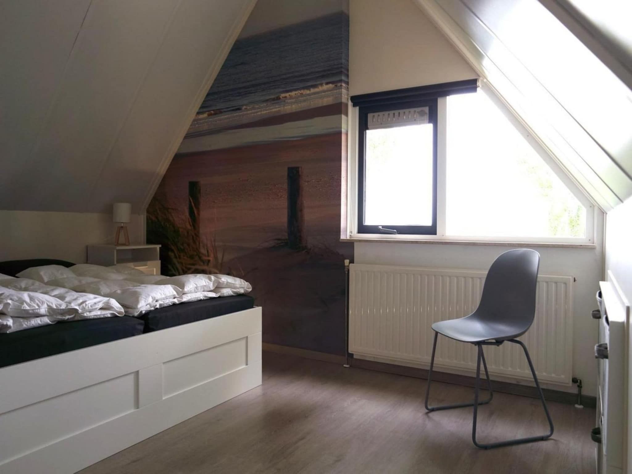 Een slaapkamer van Schoneveld 184 Stern Breskens in Breskens