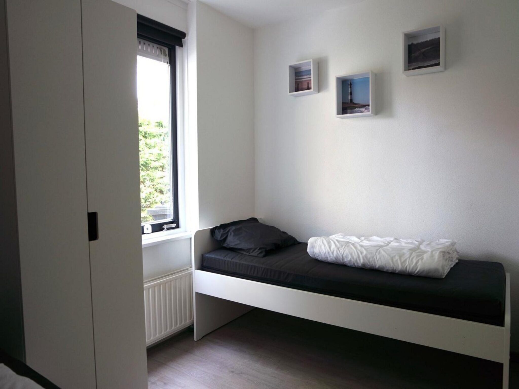 Een slaapkamer van Schoneveld 184 Stern Breskens in Breskens