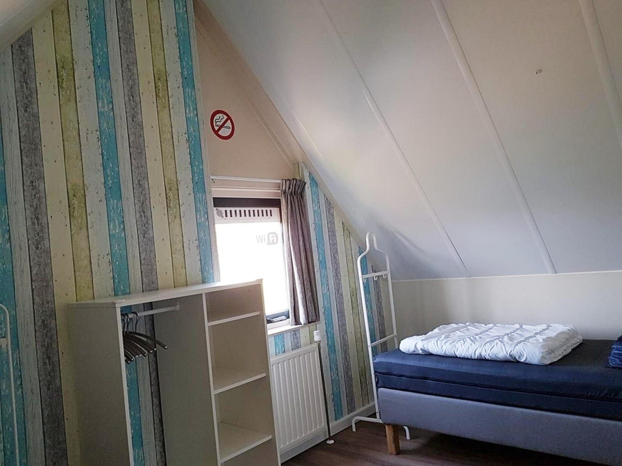 Een slaapkamer van Schoneveld 232 Stern Breskens in Breskens