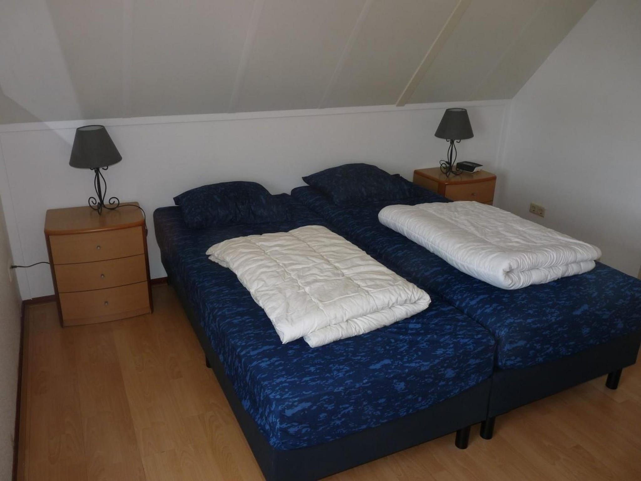 Een slaapkamer van Schoneveld 246 Stern Breskens in Breskens