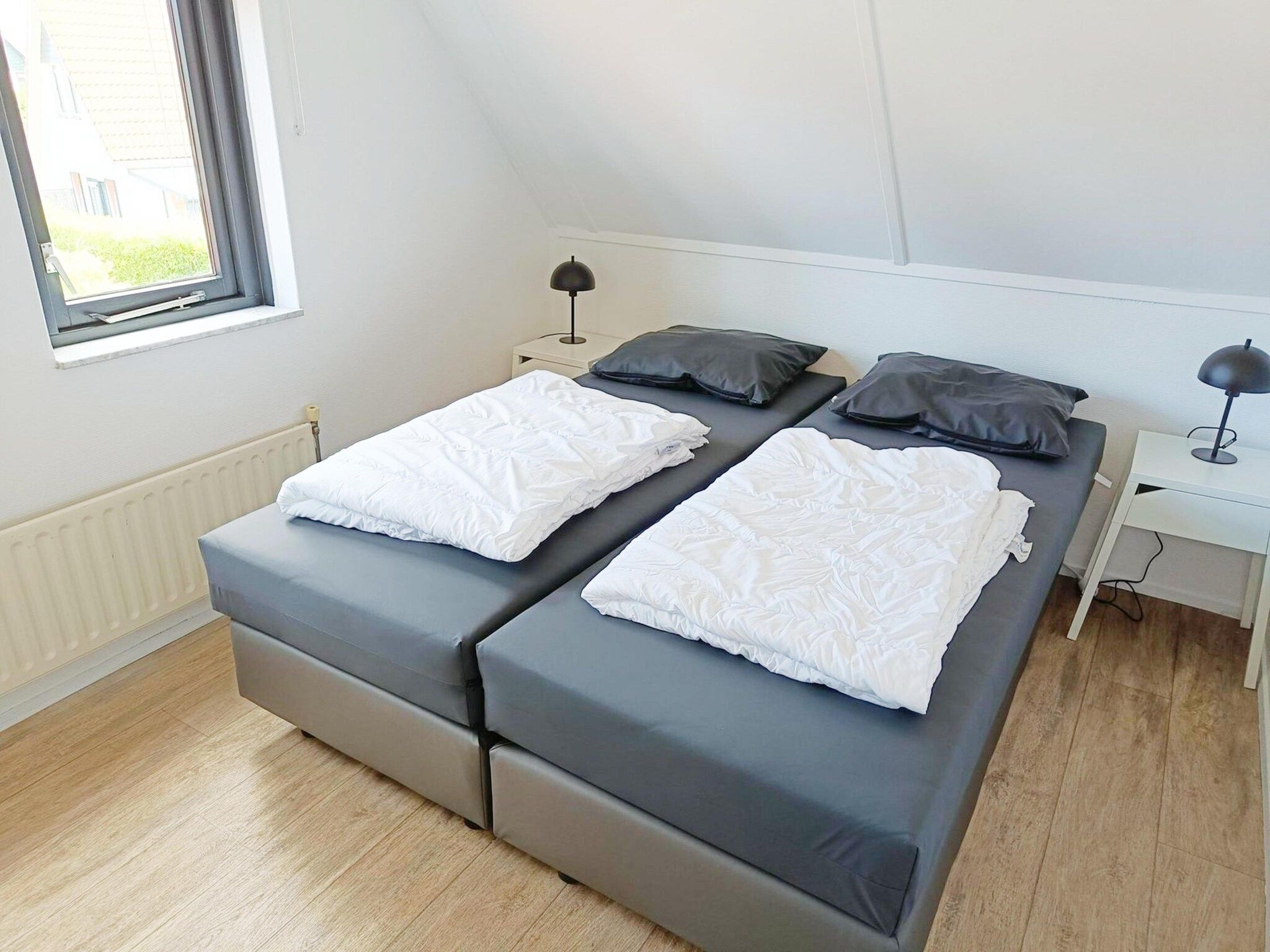 Een slaapkamer van Schoneveld 124 Zeemeeuw Breskens in Breskens