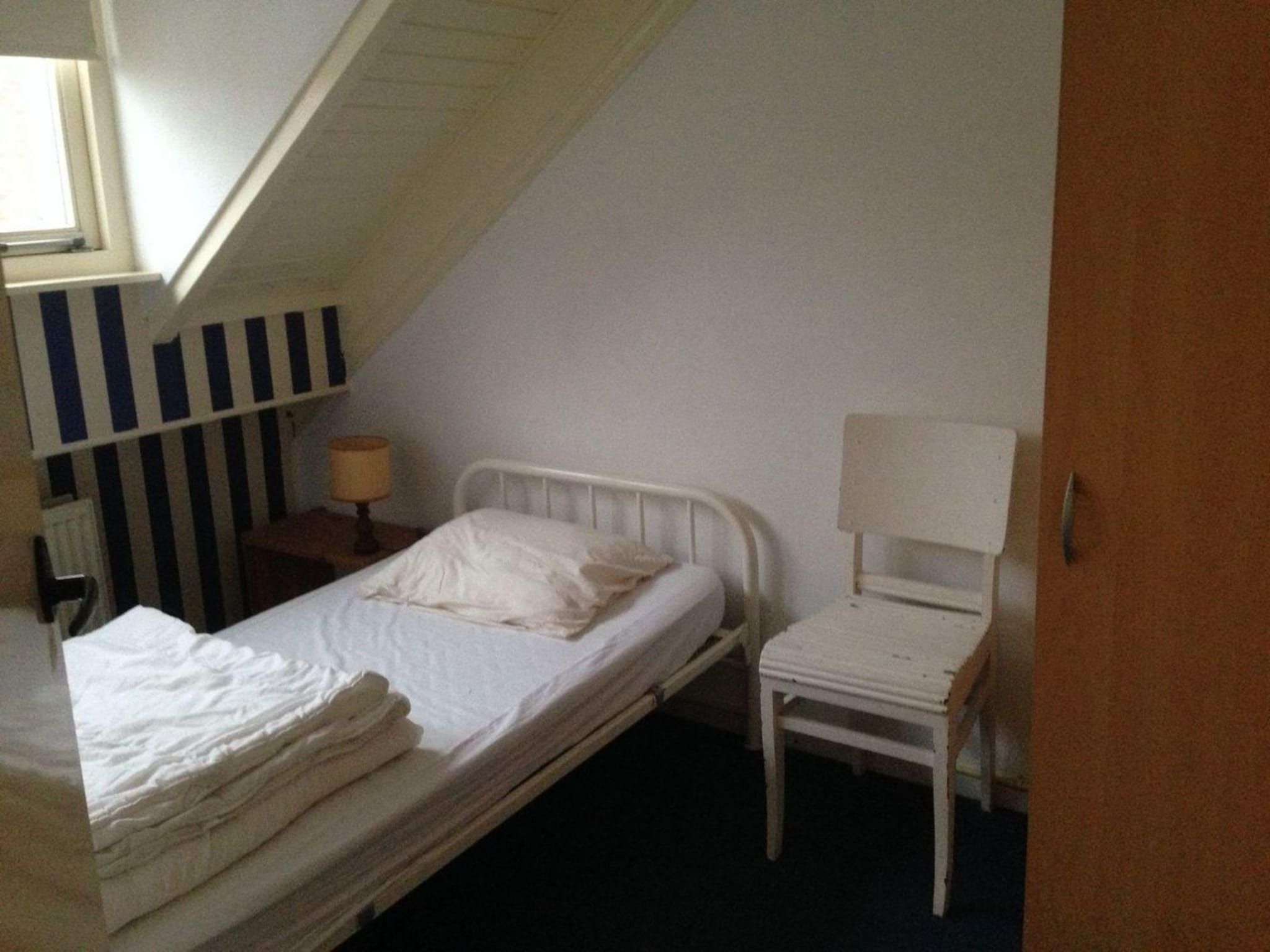 Een slaapkamer van 2e Zandstraat 9 Breskens in Breskens