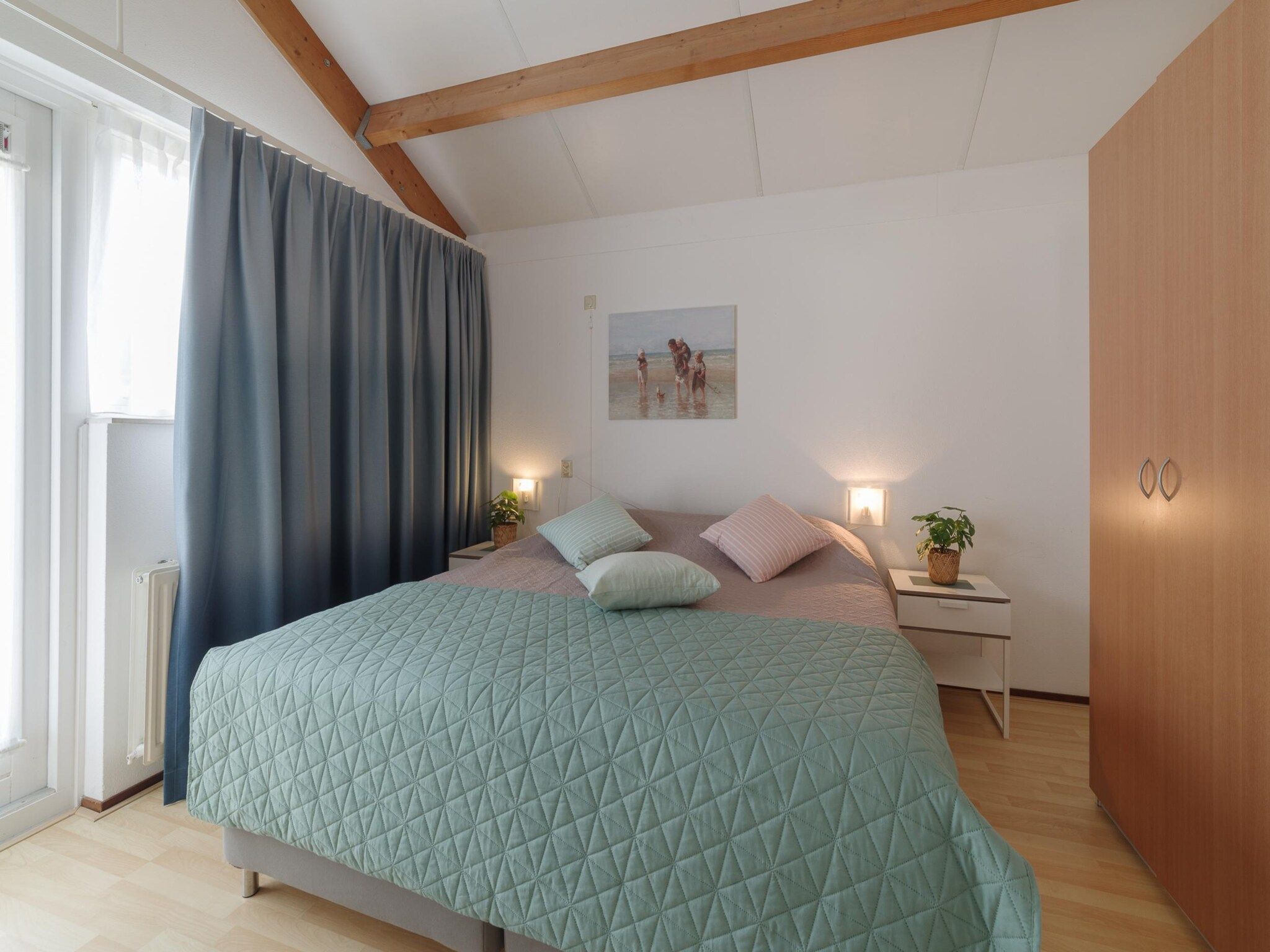 Een slaapkamer van Villapark De Oesterbaai 17 in Wemeldinge