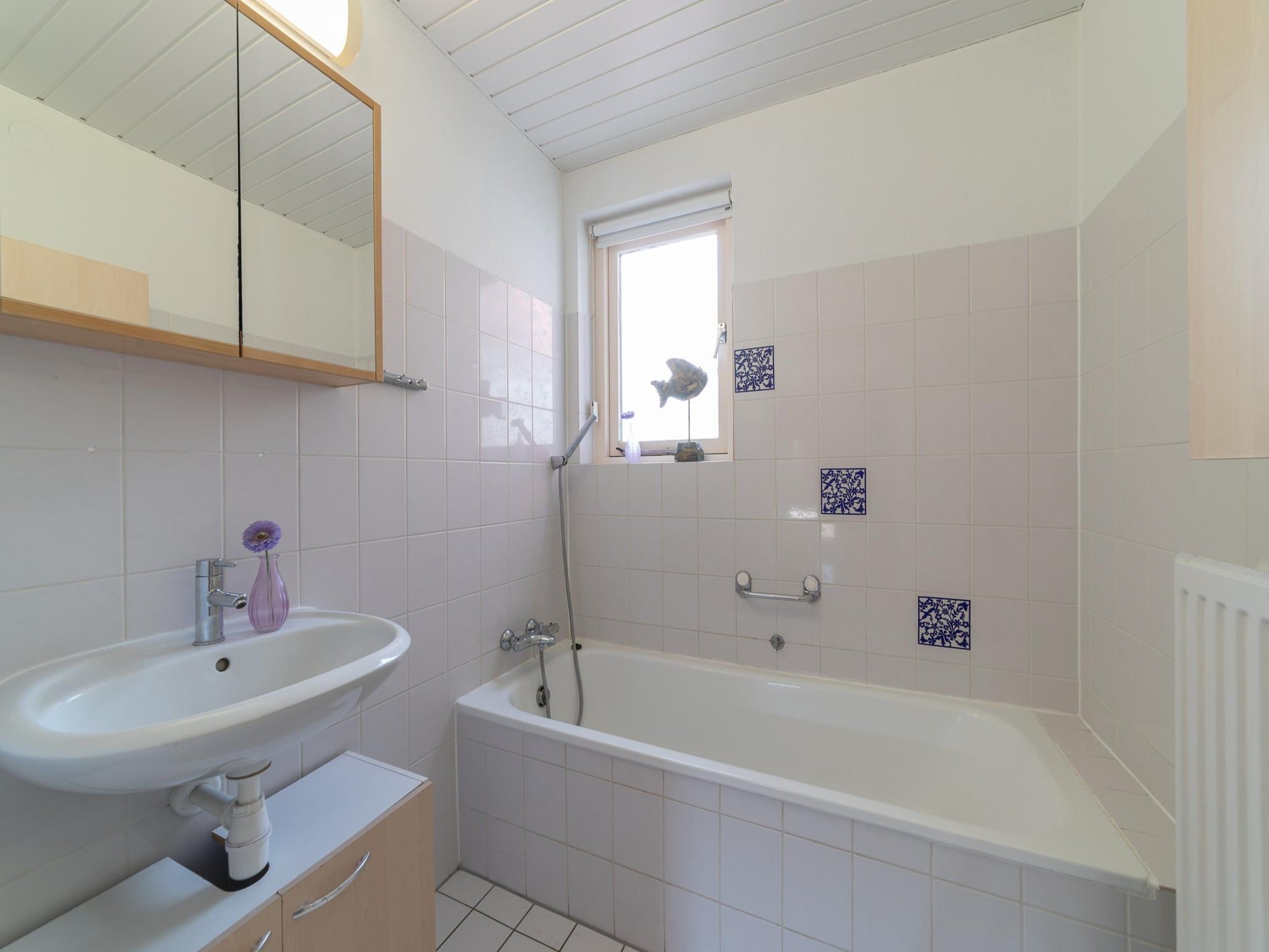 De badkamer van Villapark De Oesterbaai 26 in Wemeldinge