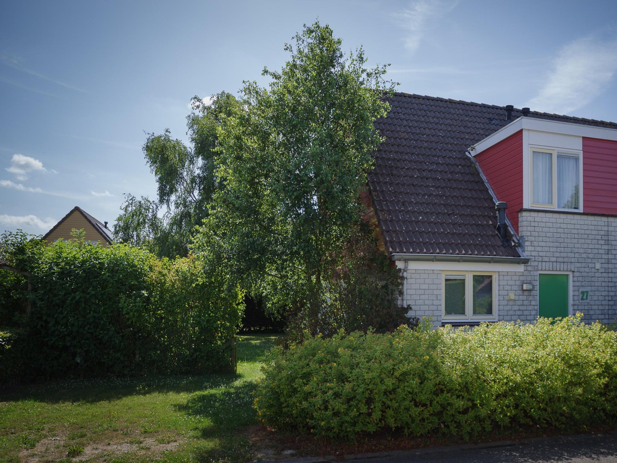 De buitenkant van Villapark De Oesterbaai 27 in Wemeldinge
