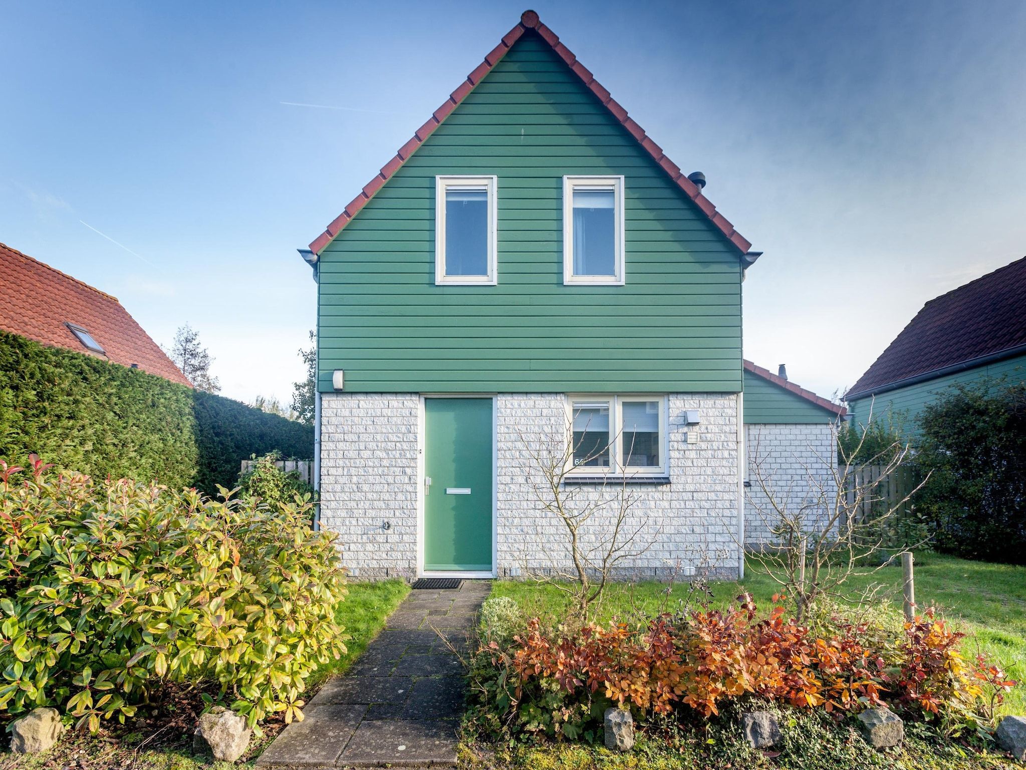 De buitenkant van Villapark De Oesterbaai 64 in Wemeldinge