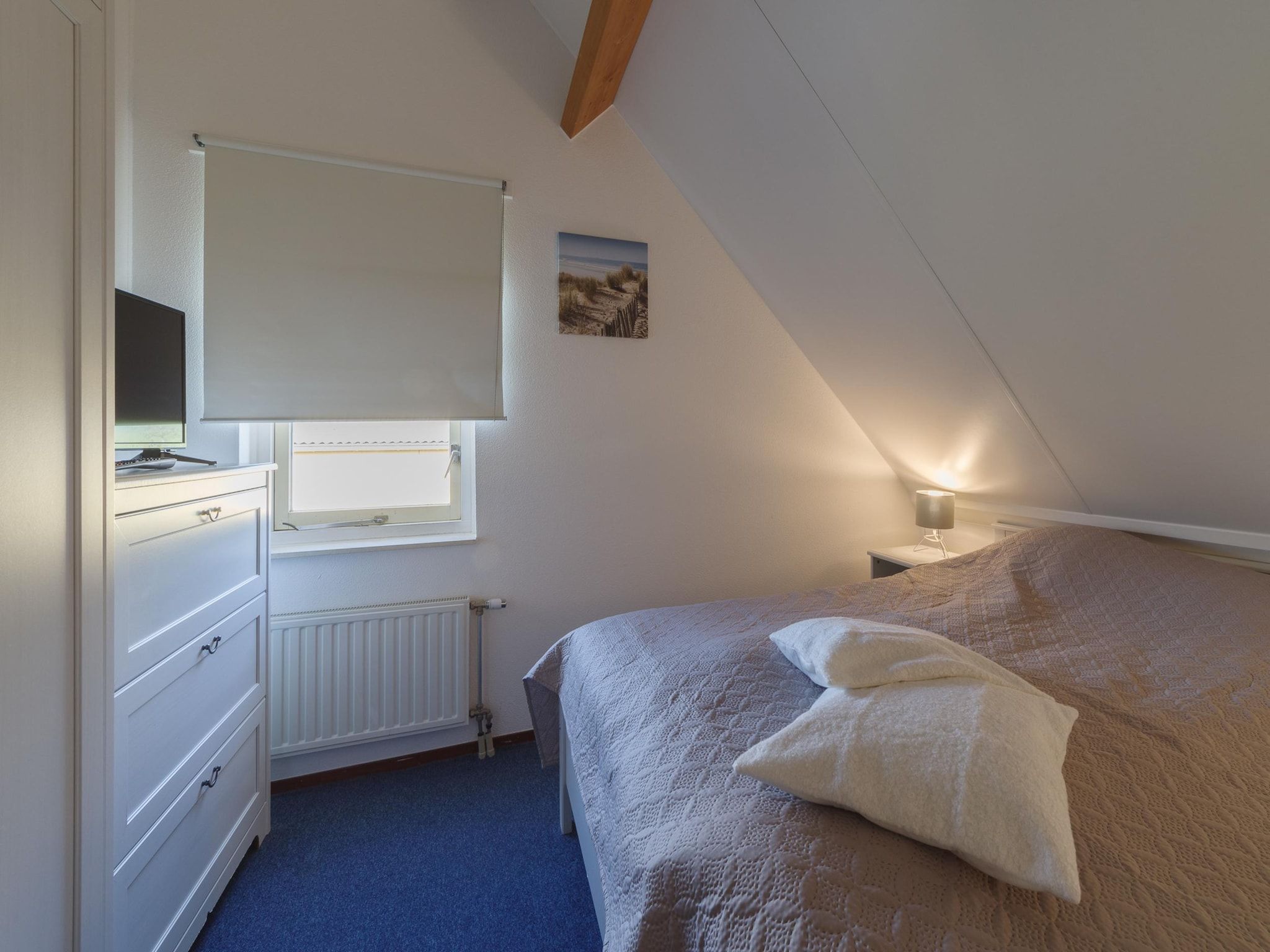 Een slaapkamer van Villapark De Oesterbaai 89 in Wemeldinge