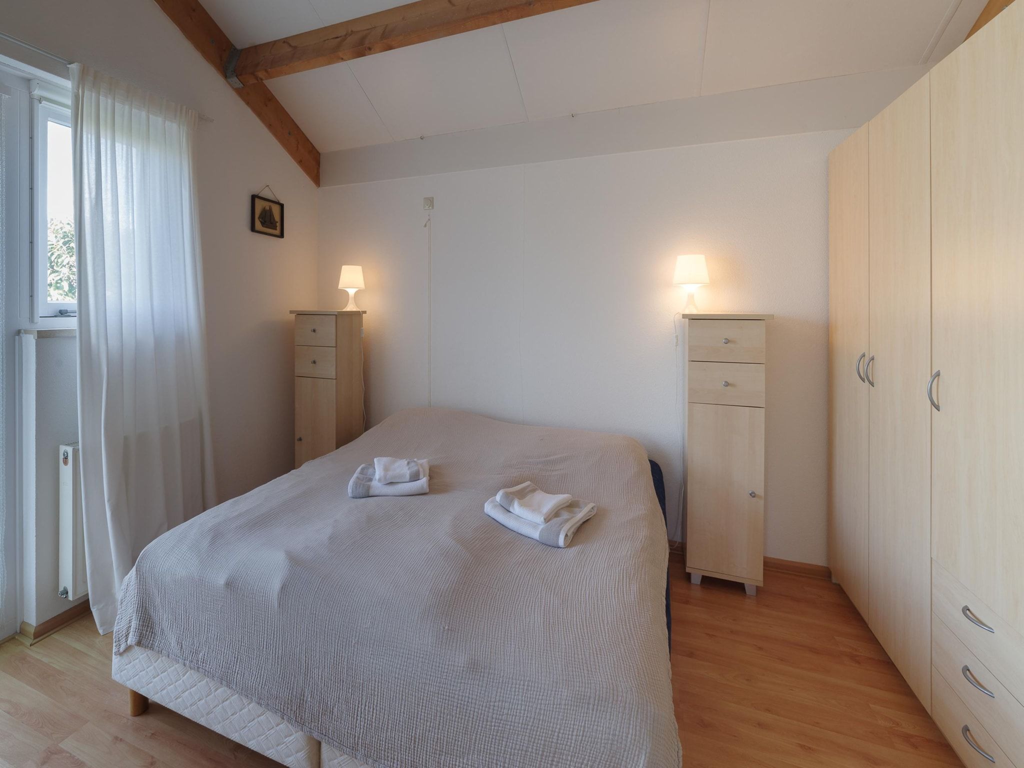 Een slaapkamer van Villapark De Oesterbaai 96 in Wemeldinge