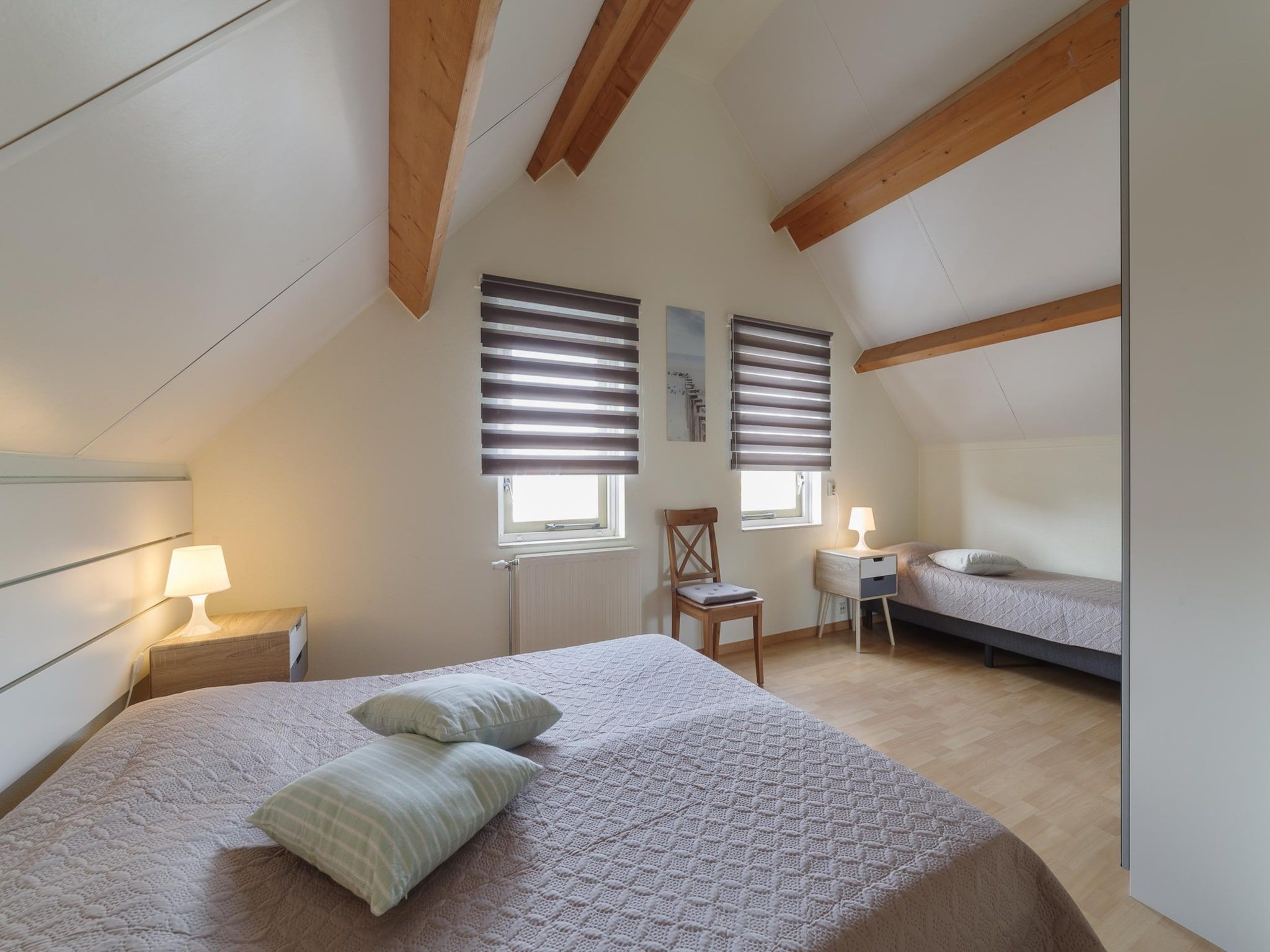 Een slaapkamer van Villapark De Oesterbaai 112 in Wemeldinge