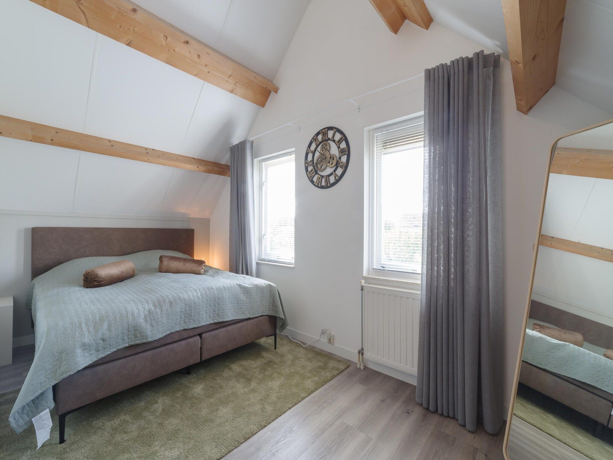 Een slaapkamer van Villapark De Oesterbaai 126 in Wemeldinge