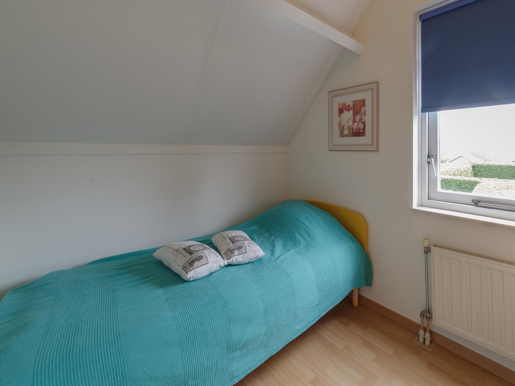 Een slaapkamer van Villapark De Oesterbaai 131 in Wemeldinge
