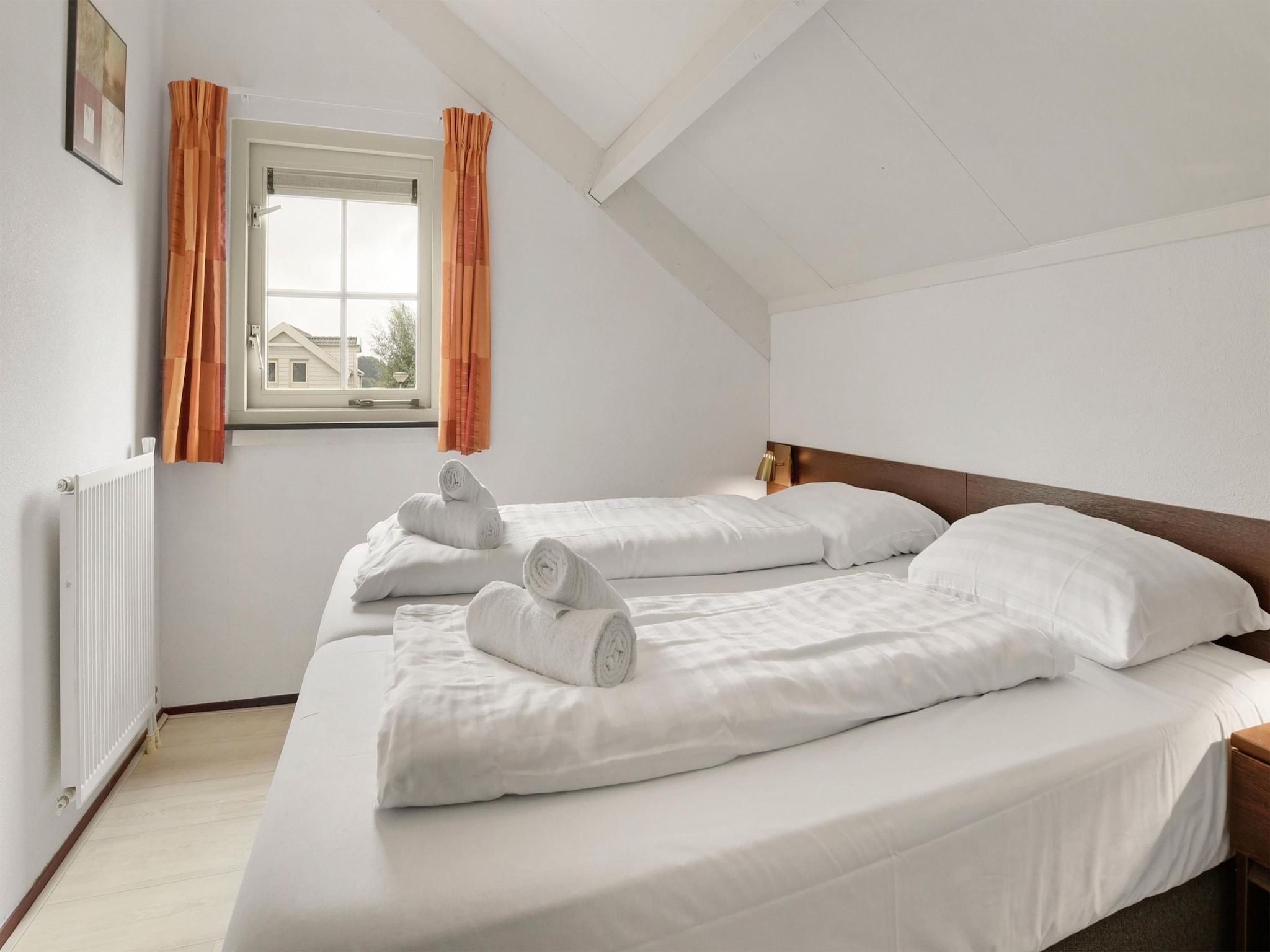 Een slaapkamer van Villapark Zuytland Buiten 336 in Simonshaven