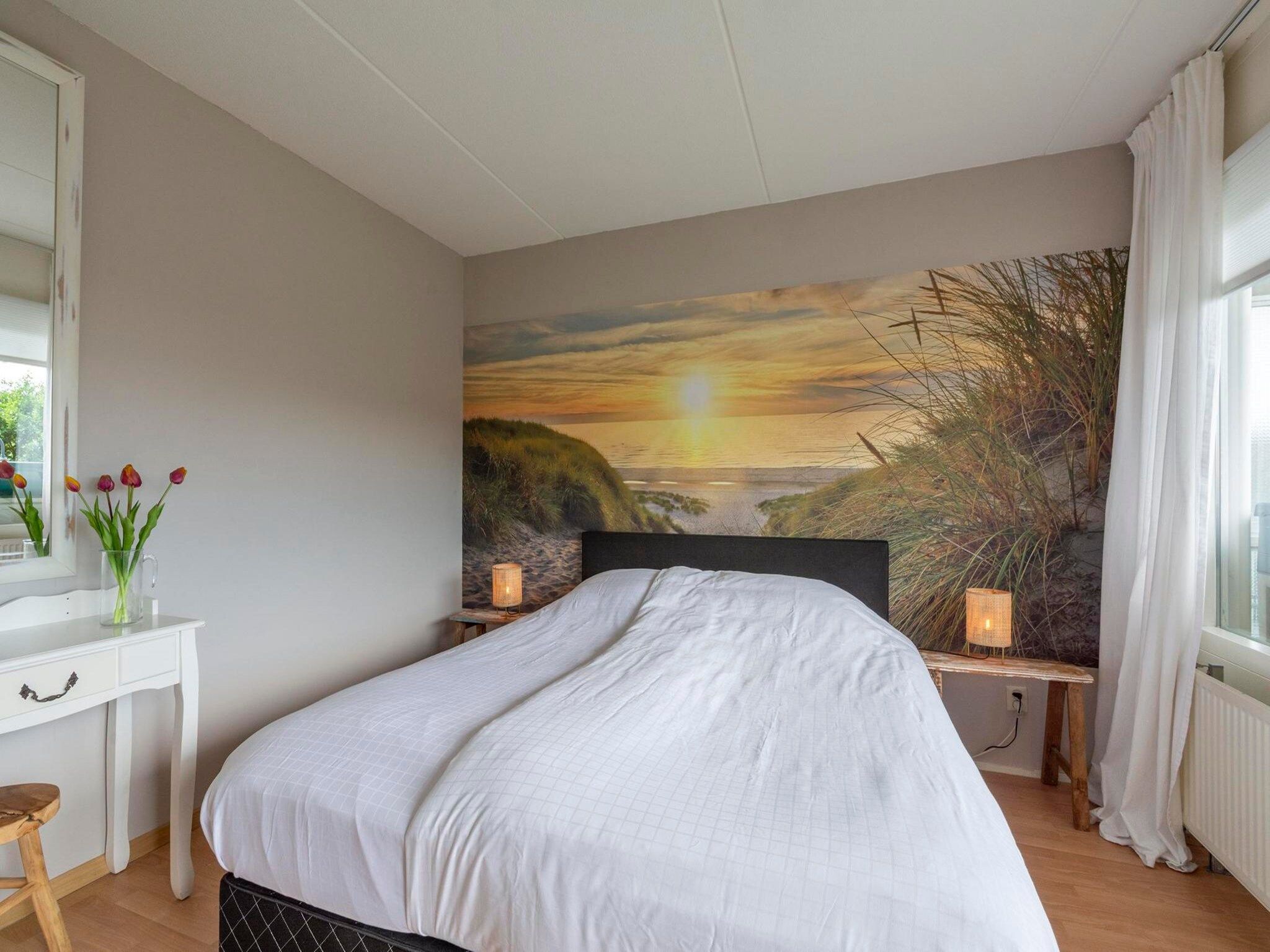 Een slaapkamer van Beach Appartement 28 in Callantsoog