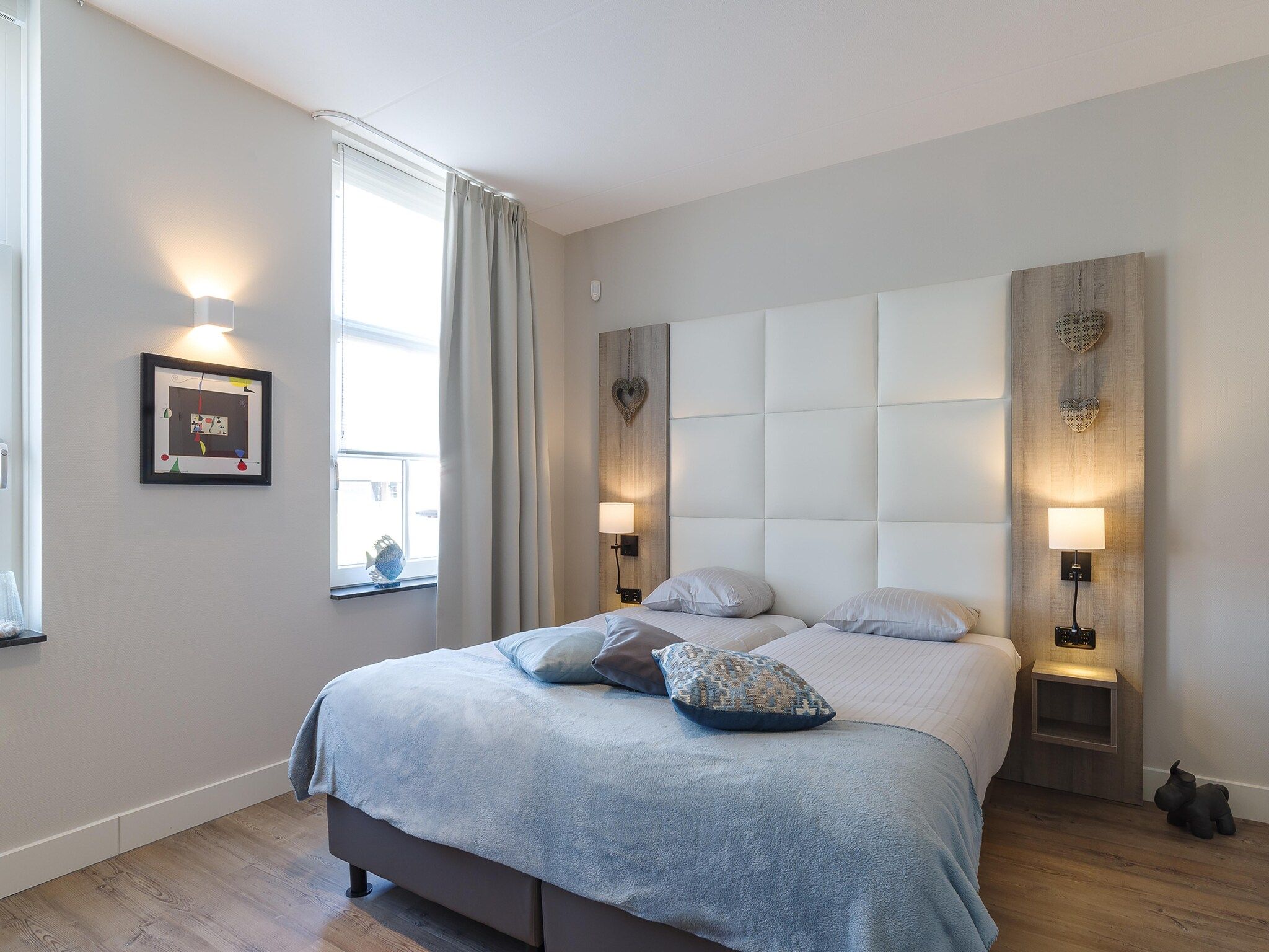 Een slaapkamer van Game Villa in Colijnsplaat