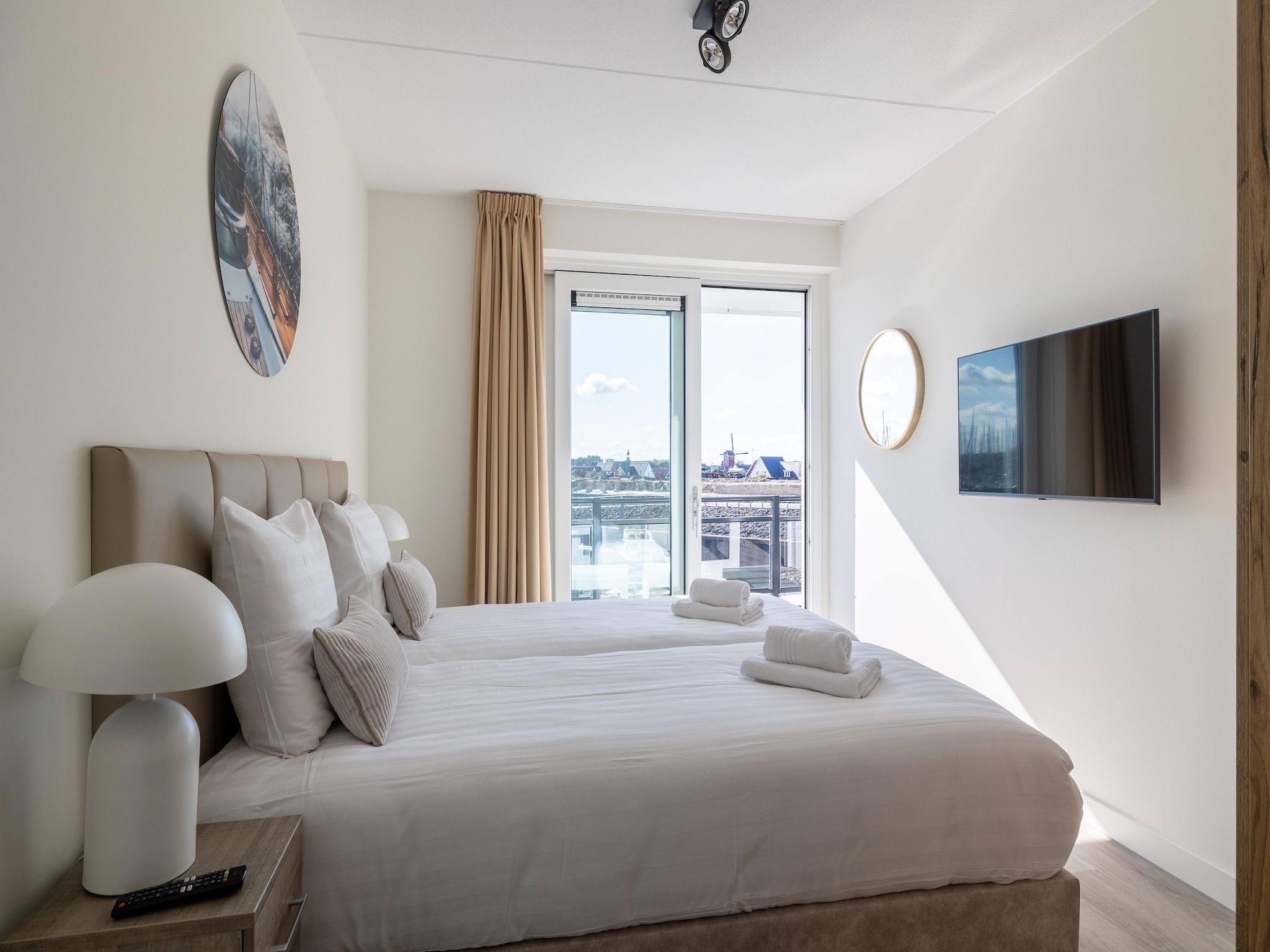 Een slaapkamer van Appartement Vista Maris "Charlotte's Parel" - Havenweg 8-44  Sint-Annaland in Sint-Annaland