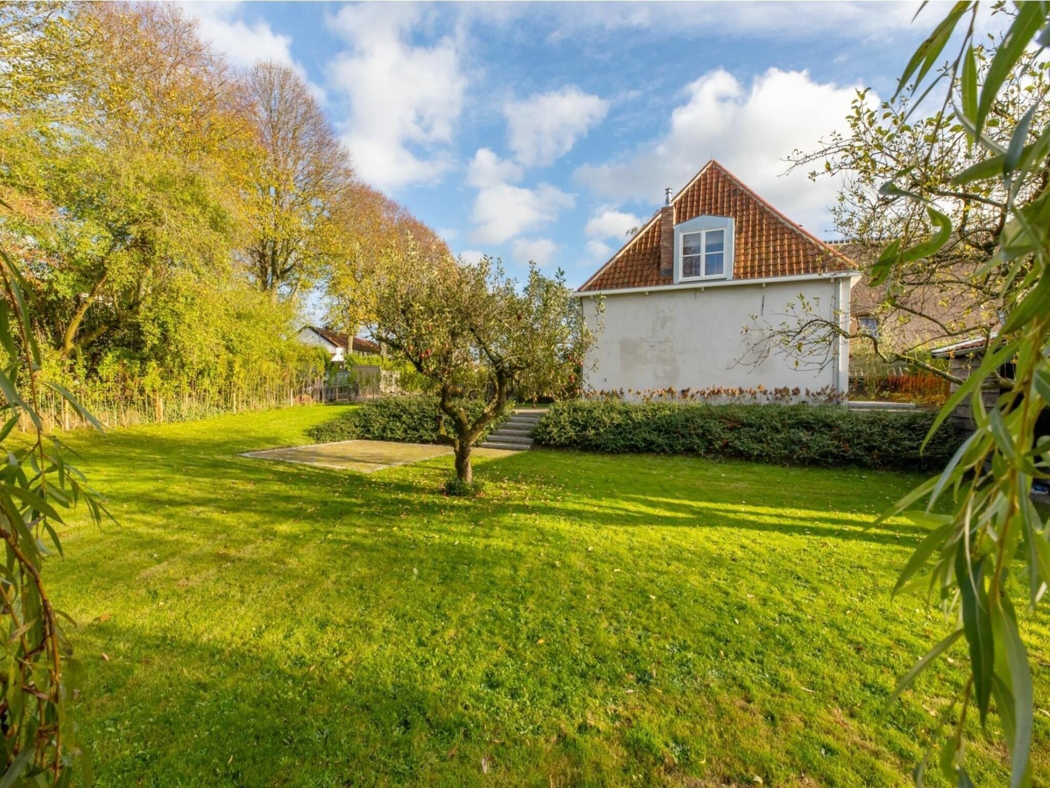De tuin van Vakantiehuis 'Boerderij Molenhof' - Stationsweg 5  Heinkenszand in Heinkenszand