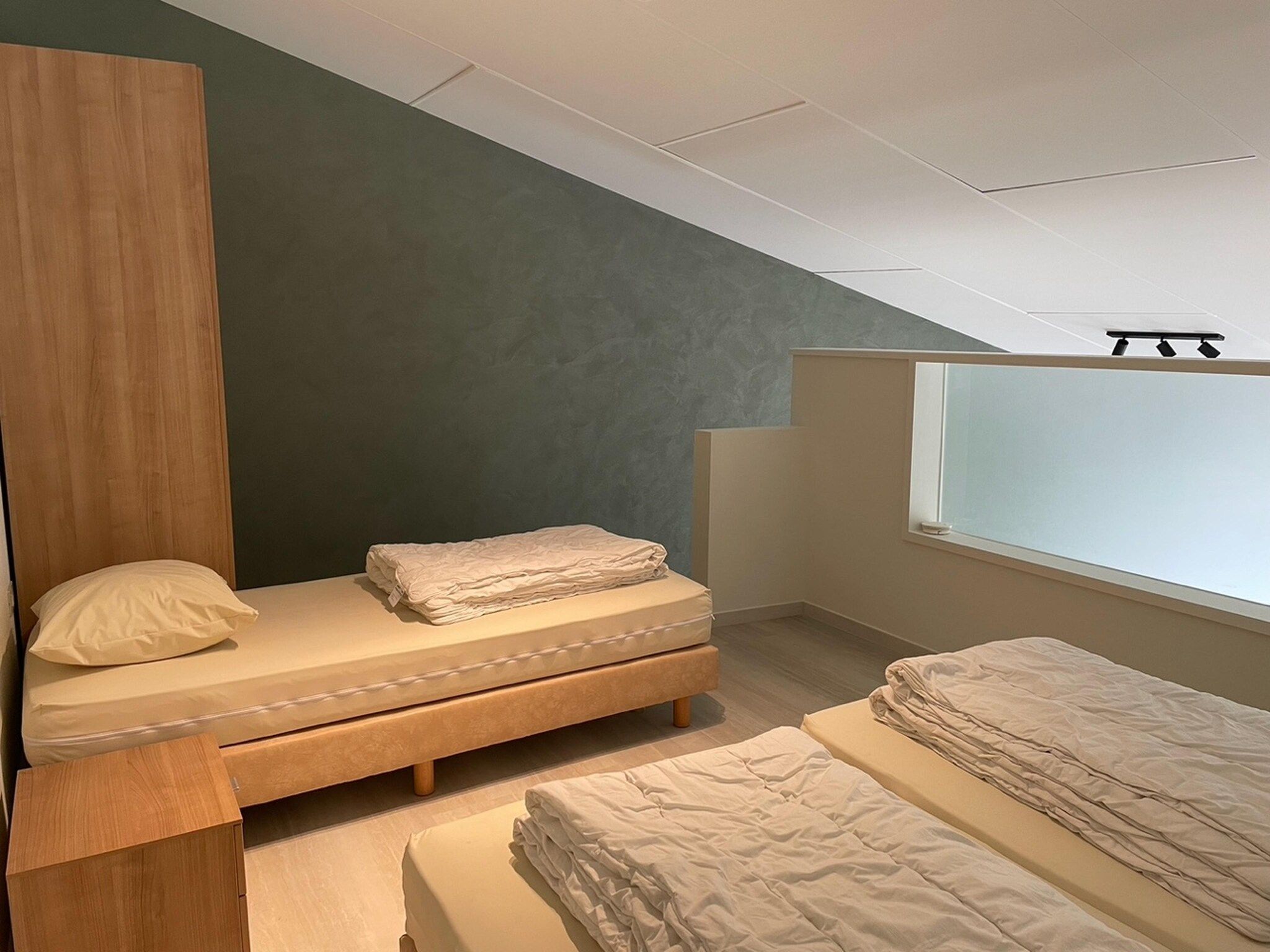 Een slaapkamer van Het Platte Putje - Huisdier - nr1 in Groede