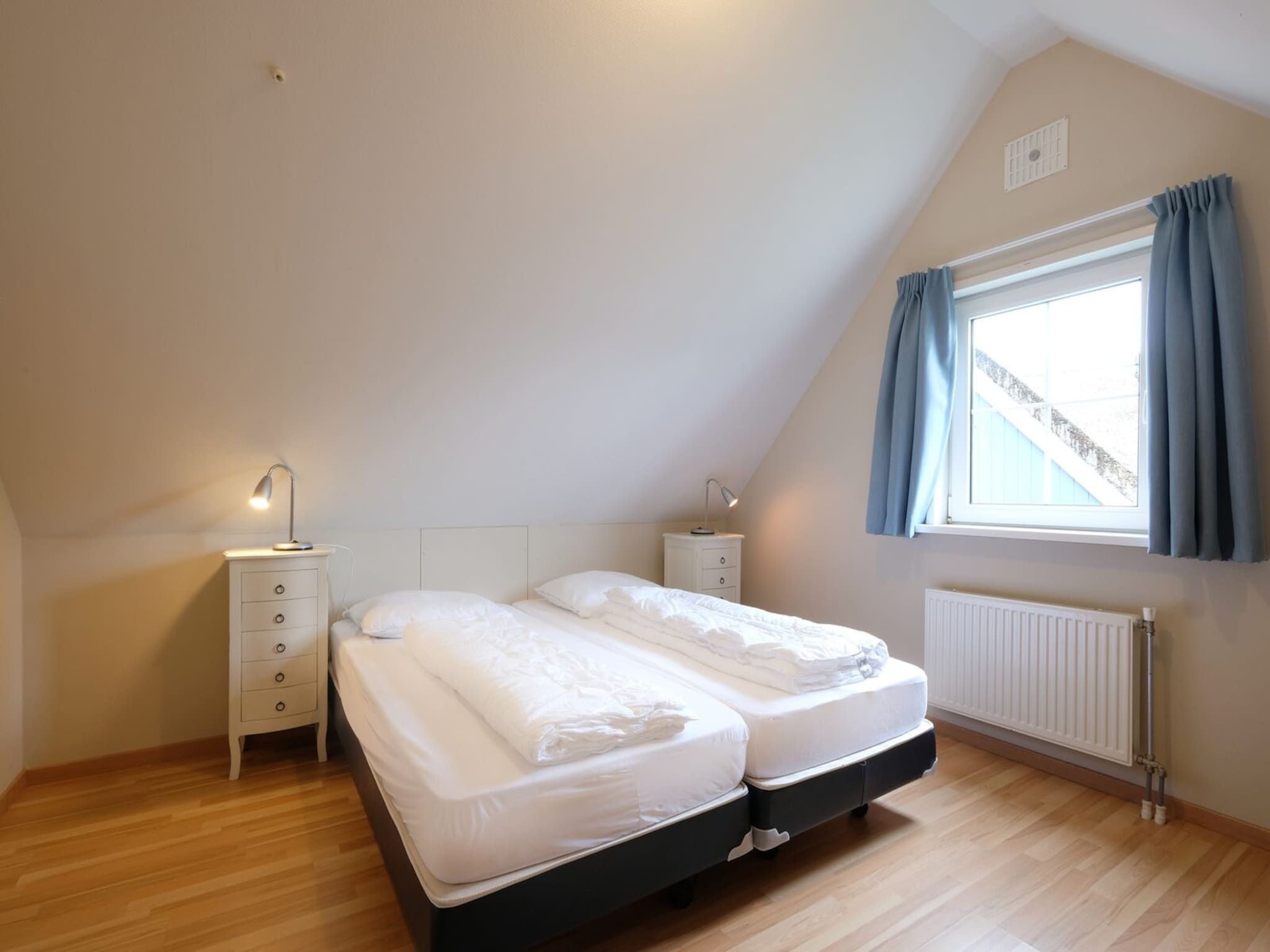 Een slaapkamer van Anzelhoef 2 in Sint Maartenszee