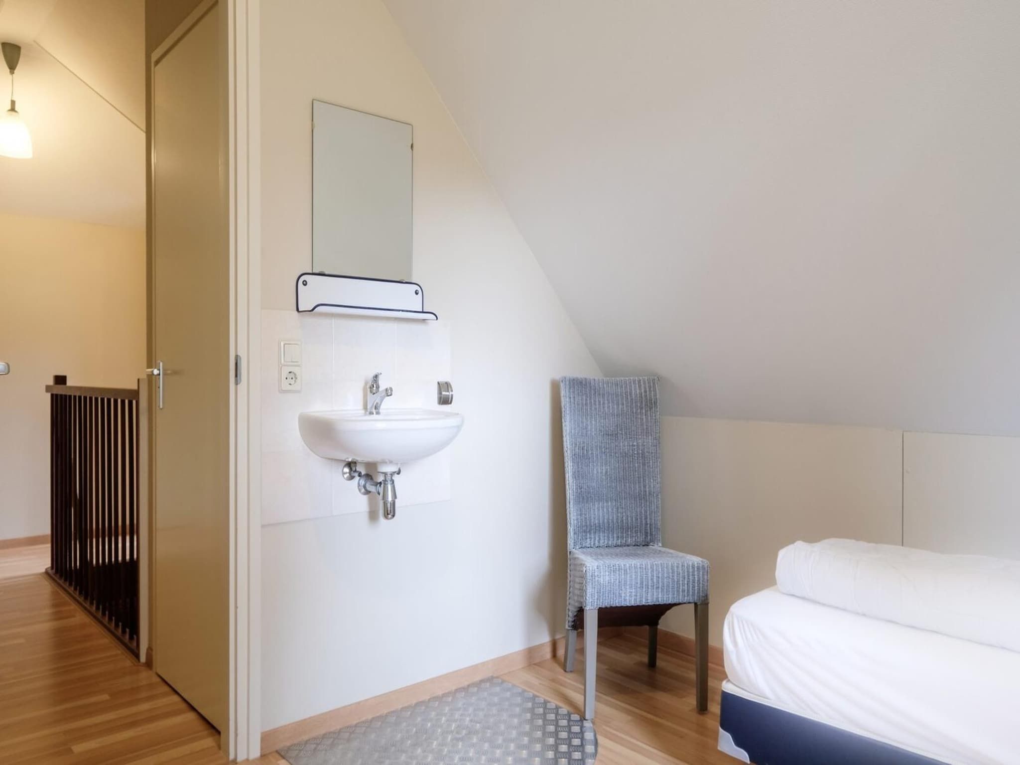 Een slaapkamer van Anzelhoef 2 in Sint Maartenszee