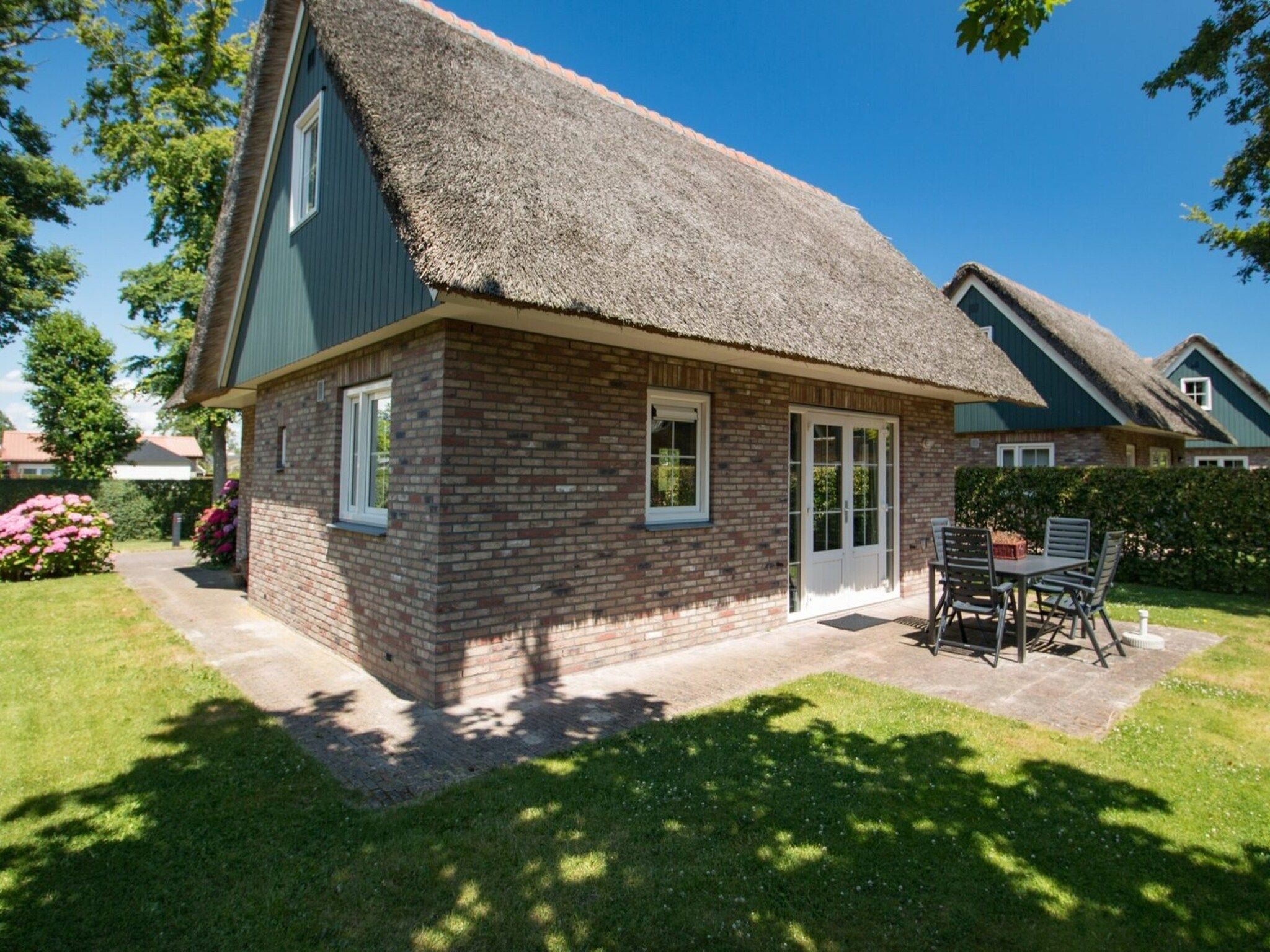 De woonkamer van Anzelhoef 3 in Sint Maartenszee