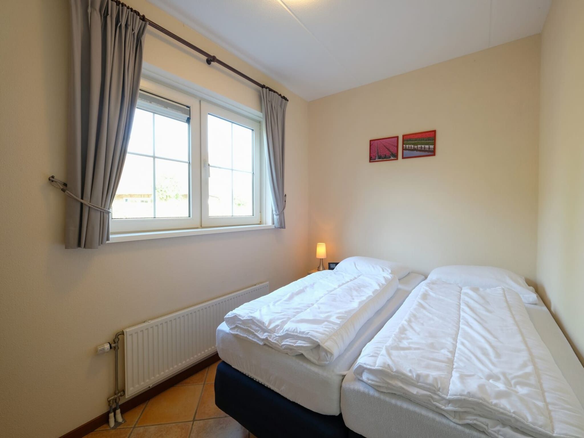 Een slaapkamer van Anzelhoef 8 in Sint Maartenszee