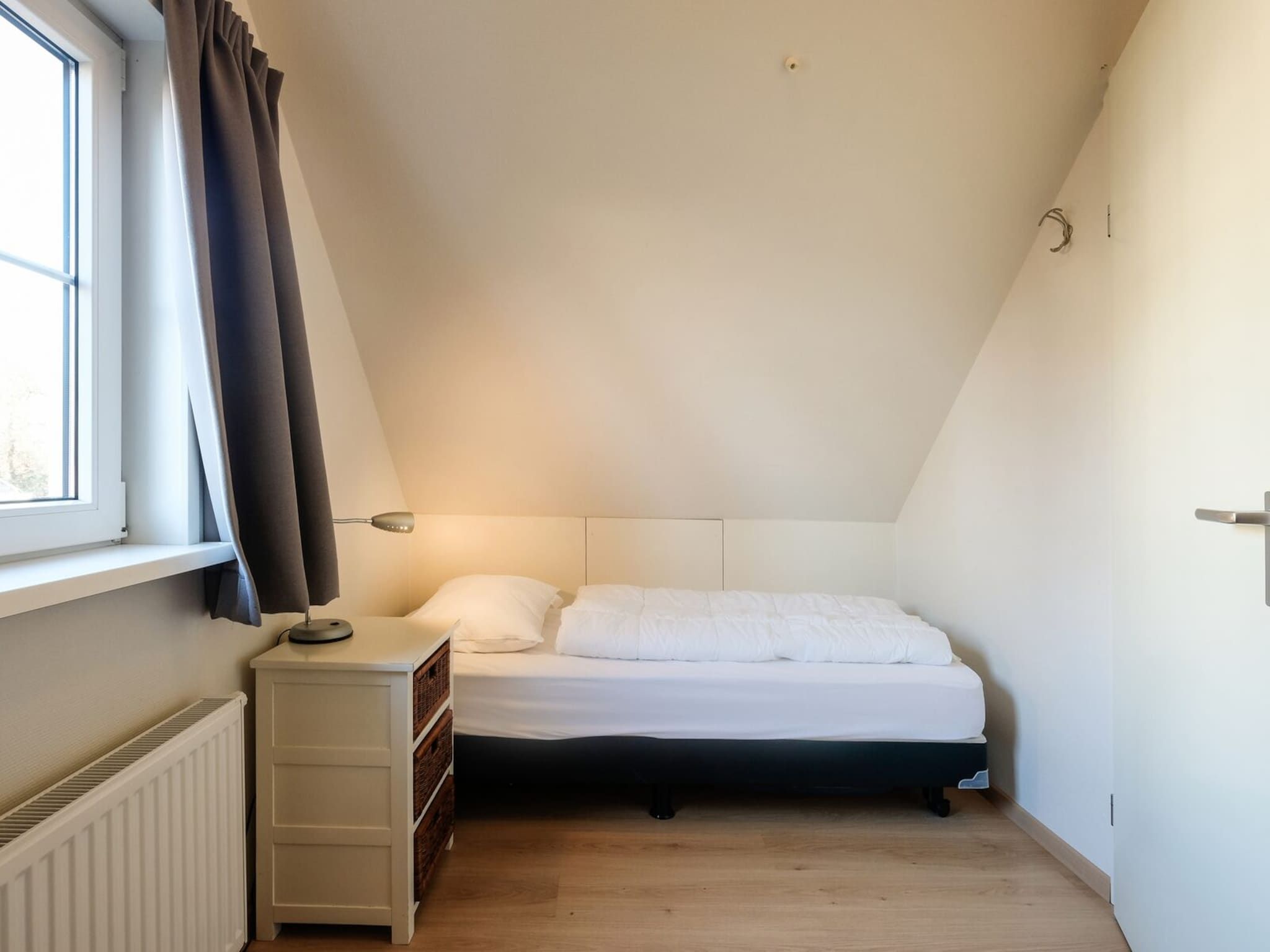 Een slaapkamer van Anzelhoef XL 19 in Sint Maartenszee