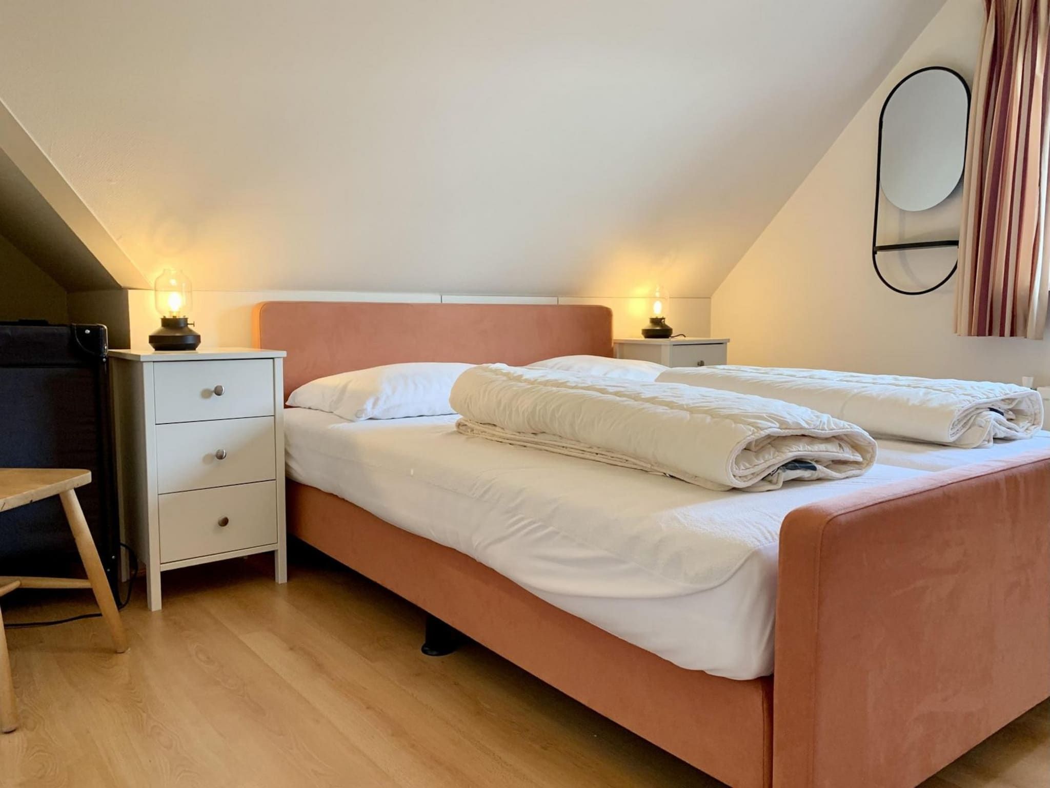 Een slaapkamer van Anzelhoef 25 in Sint Maartenszee