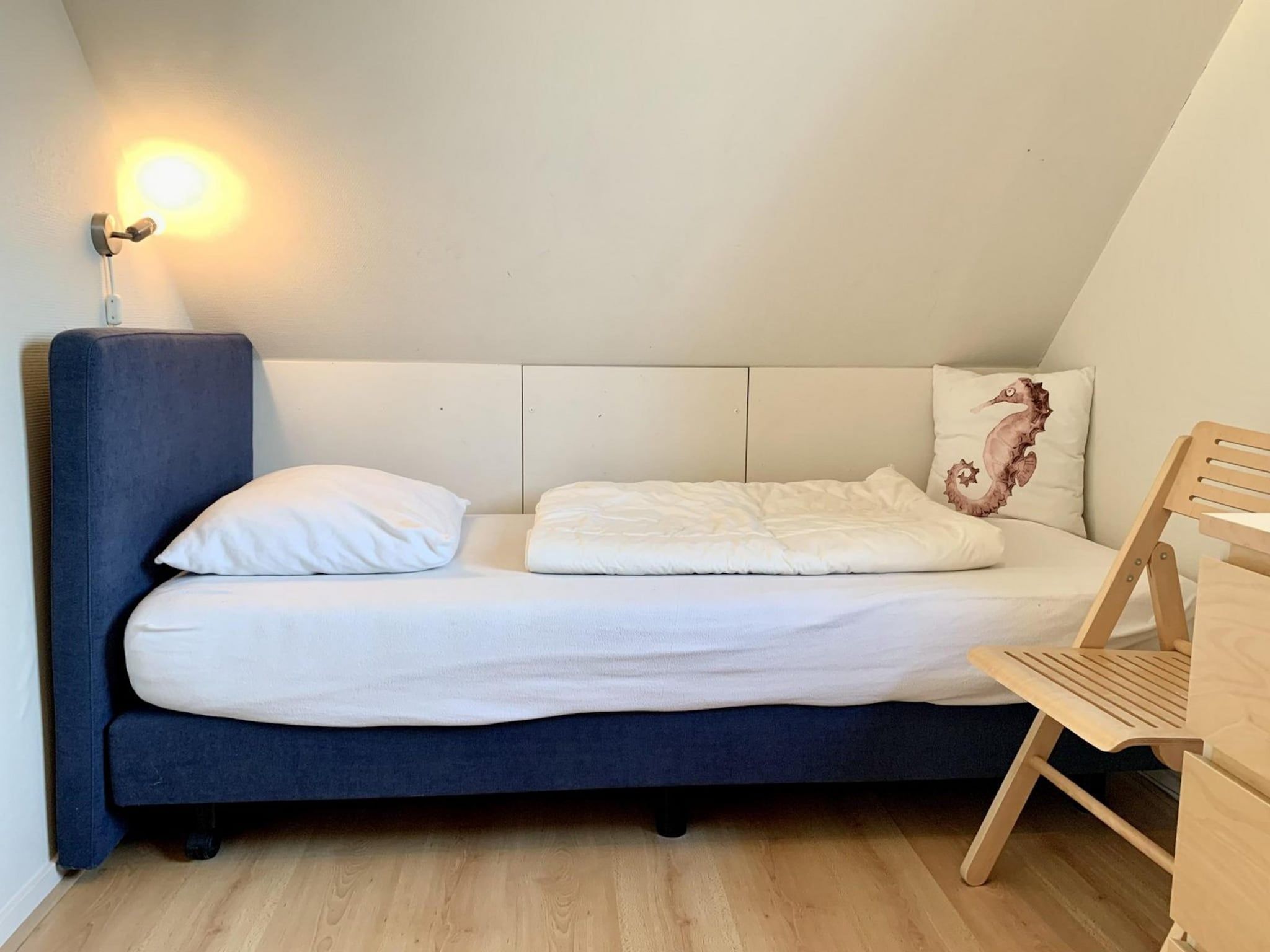 Een slaapkamer van Anzelhoef 25 in Sint Maartenszee