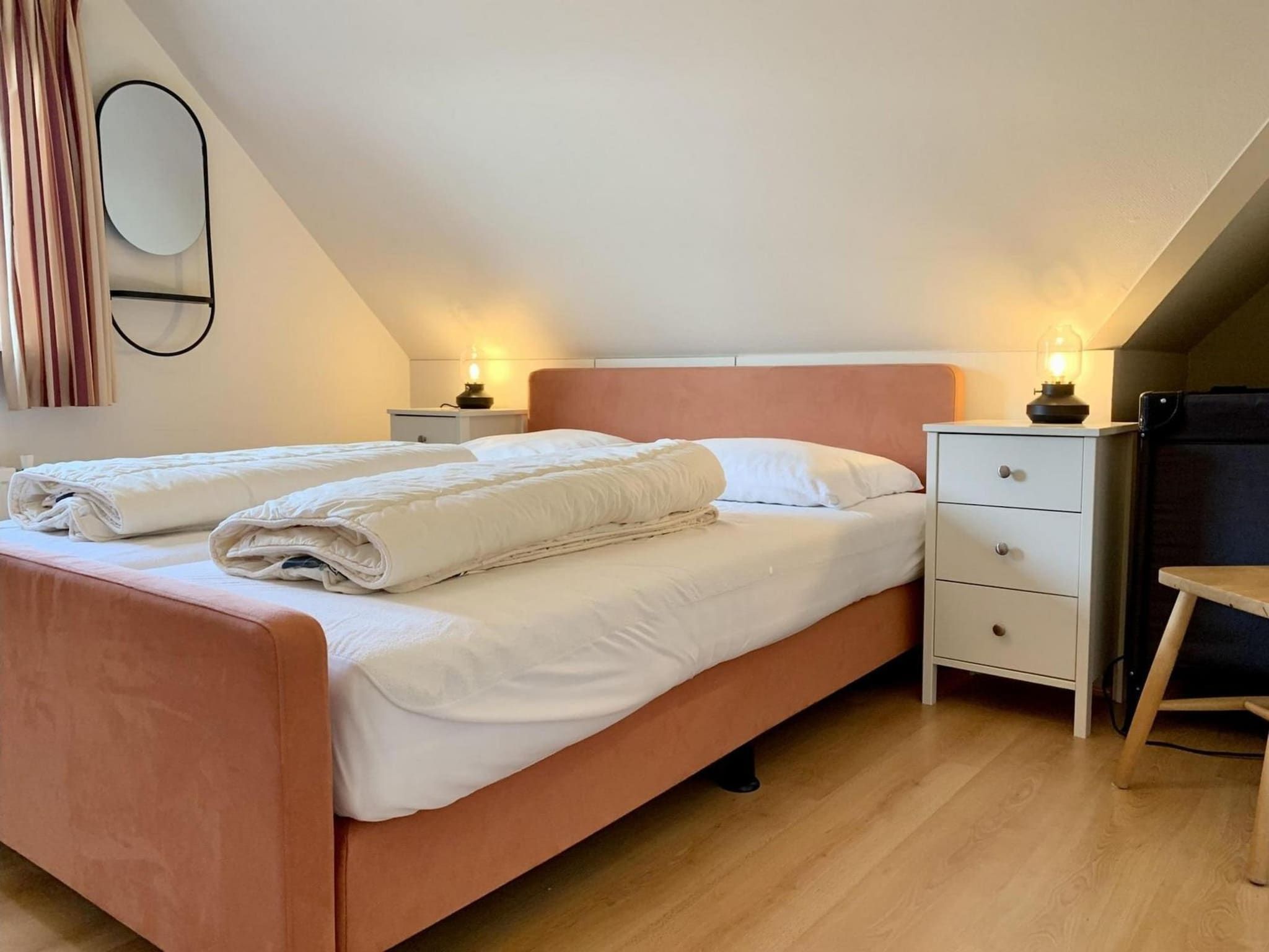 Een slaapkamer van Anzelhoef 25 in Sint Maartenszee