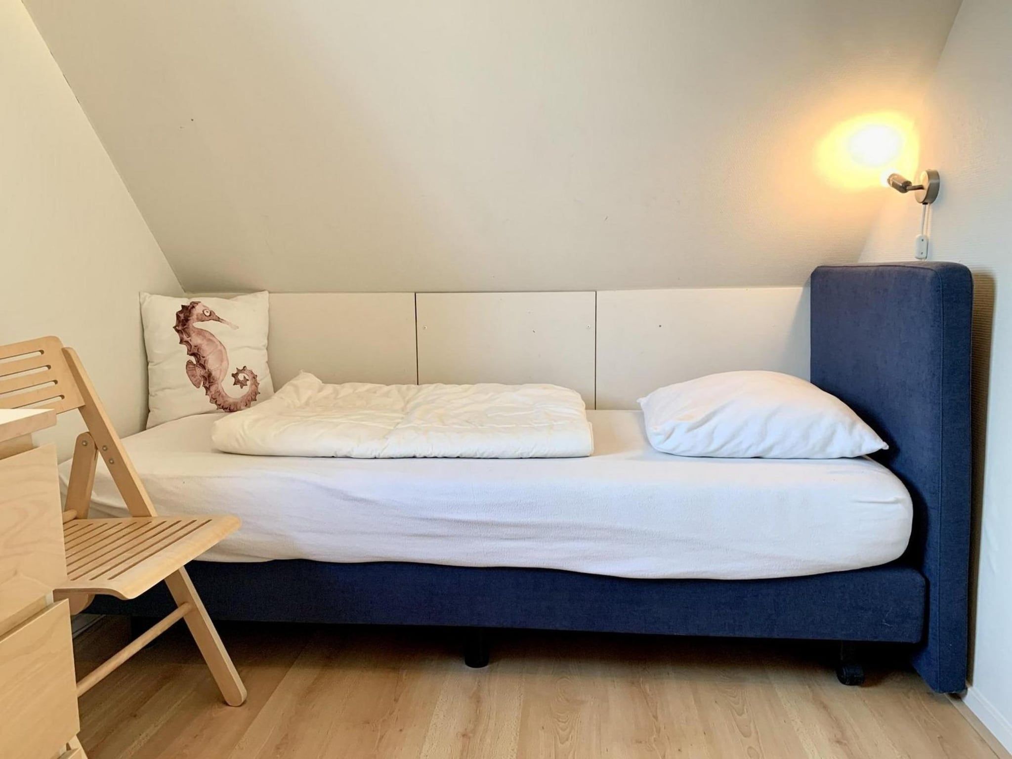 Een slaapkamer van Anzelhoef 25 in Sint Maartenszee